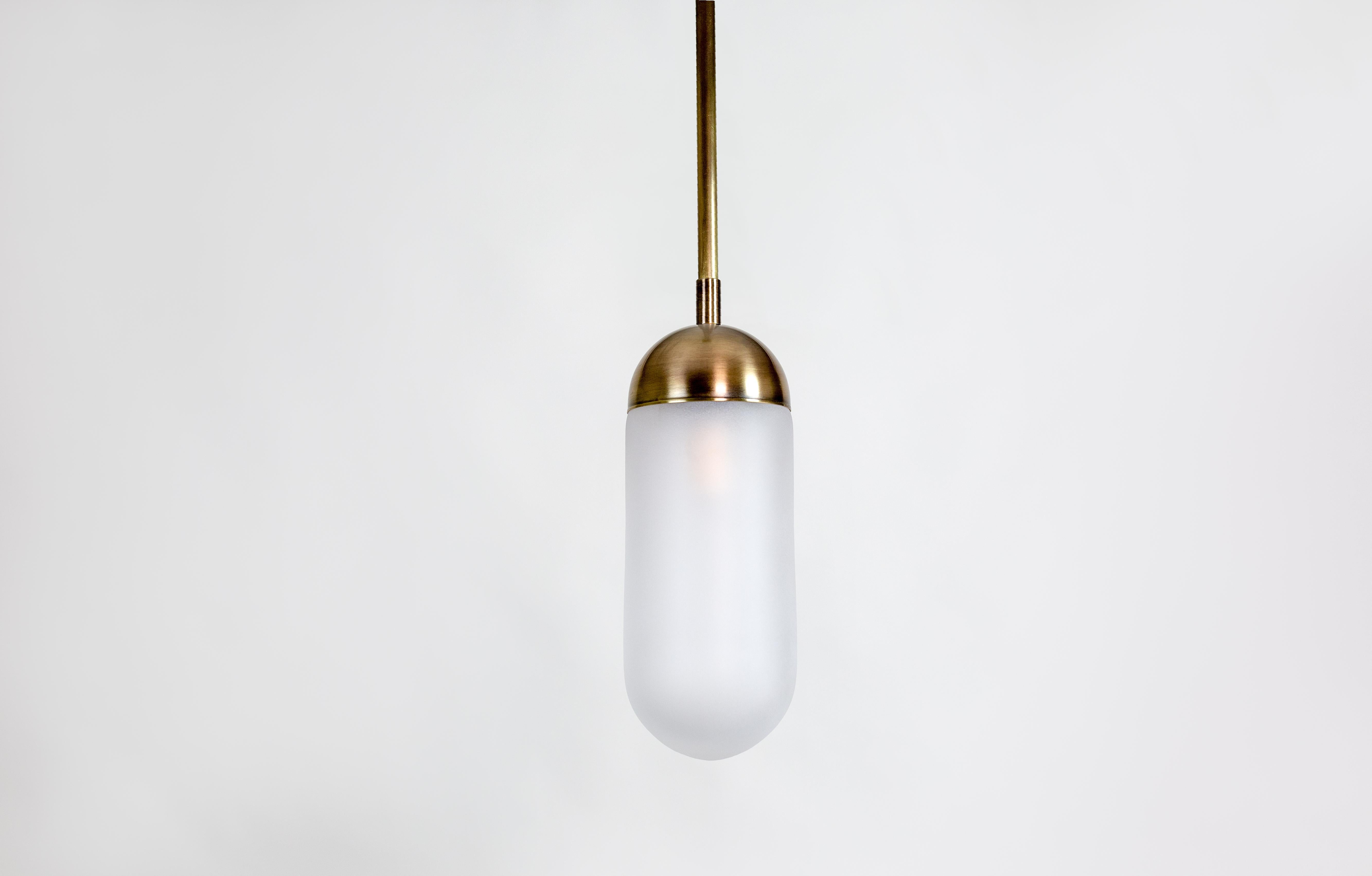 Modern Meridian Single, Capsule Contemporary Pendant, Glass, Antique Brass, Marble For Sale