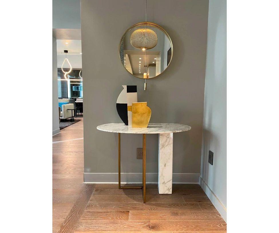 Designed By Andrea Parisio 

Finishes: CALACATTA GOLD MARBLE TOP - METAL BASE: BRONZE BRASS VARNISHED IRON.
