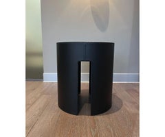 Tavolino in pelle nera Meridiani Gong