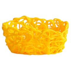 Jarrón ovalado «Edizioni del Pesce Senzafine» de Meritalia, en color amarillo, diseñado por Gaetano Pesce