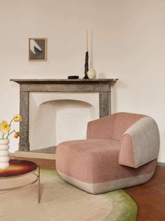 Meritalia Hug Armchair Upholstered in fabric by Cristián Mohaded