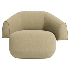 Meritalia Hug Armchair Upholstered in fabric by Cristián Mohaded