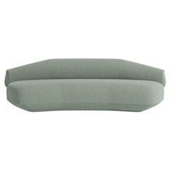 Meritalia Hug Sofa Upholstered in fabric by Cristián Mohaded