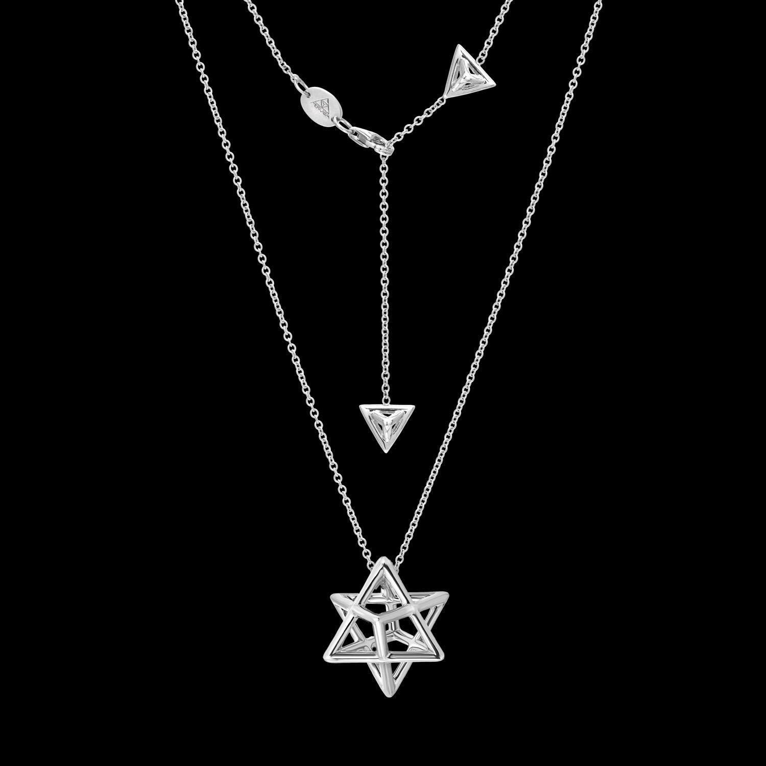 Merkaba platinum, three dimensional star tetrahedron pendant necklace, is a heirloom-quality, sacred geometric unisex jewelry piece, highlighting superb attention to detail and extraordinary polish, symmetry and equilibrium. It suspends elegantly at