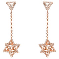 Boucles d'oreilles Merkaba en or rose et diamant étoilé