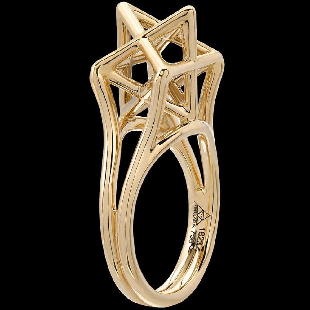 Yellow Gold Ring - Merkaba three dimensional star, 18K yellow gold ring, featuring a dramatic, sculptural design, extending upward from the hand 0.43”, a stunning three-dimensional symbol of universal light. 
Size 6. Resizing is complimentary upon