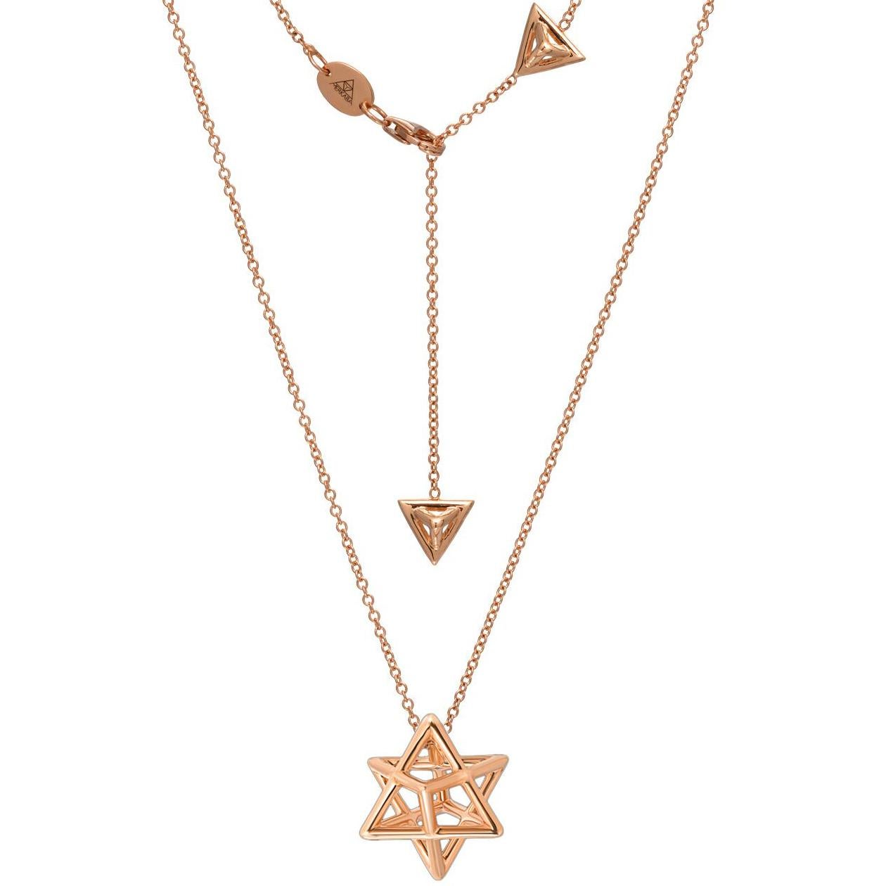 Merkaba 18K rose gold, three dimensional star tetrahedron pendant necklace, is a heirloom-quality, sacred geometric unisex jewelry piece, highlighting superb attention to detail and extraordinary polish, symmetry and equilibrium. It suspends