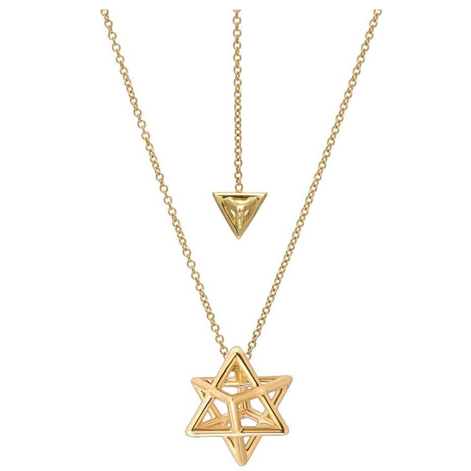 The Merkaba 18K yellow gold necklace, is a heirloom-quality, sacred geometric three dimensional jewelry piece, highlighting superb attention to detail and extraordinary polish, symmetry and equilibrium. It suspends elegantly at the chest, measuring