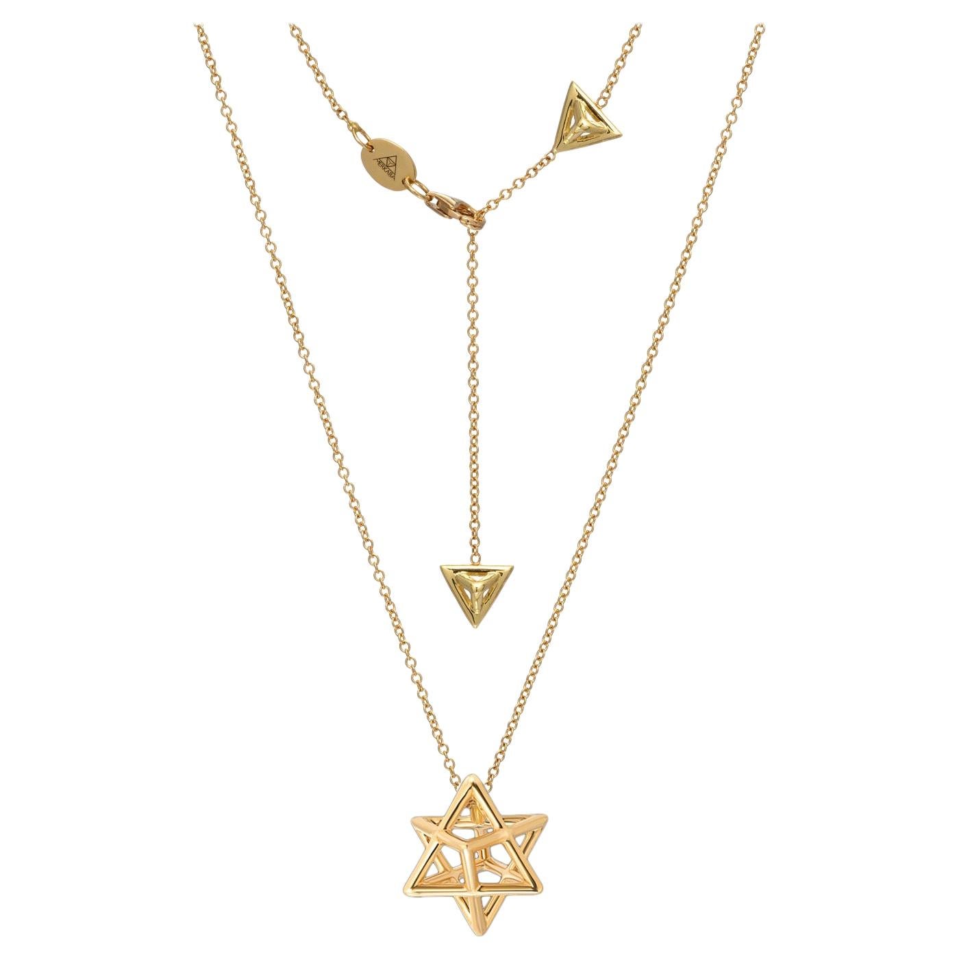 The Merkaba Body, 18K yellow gold, three dimensional star tetrahedron pendant necklace, is a heirloom-quality, sacred geometric unisex jewelry piece, highlighting superb attention to detail and extraordinary polish, symmetry and equilibrium. It