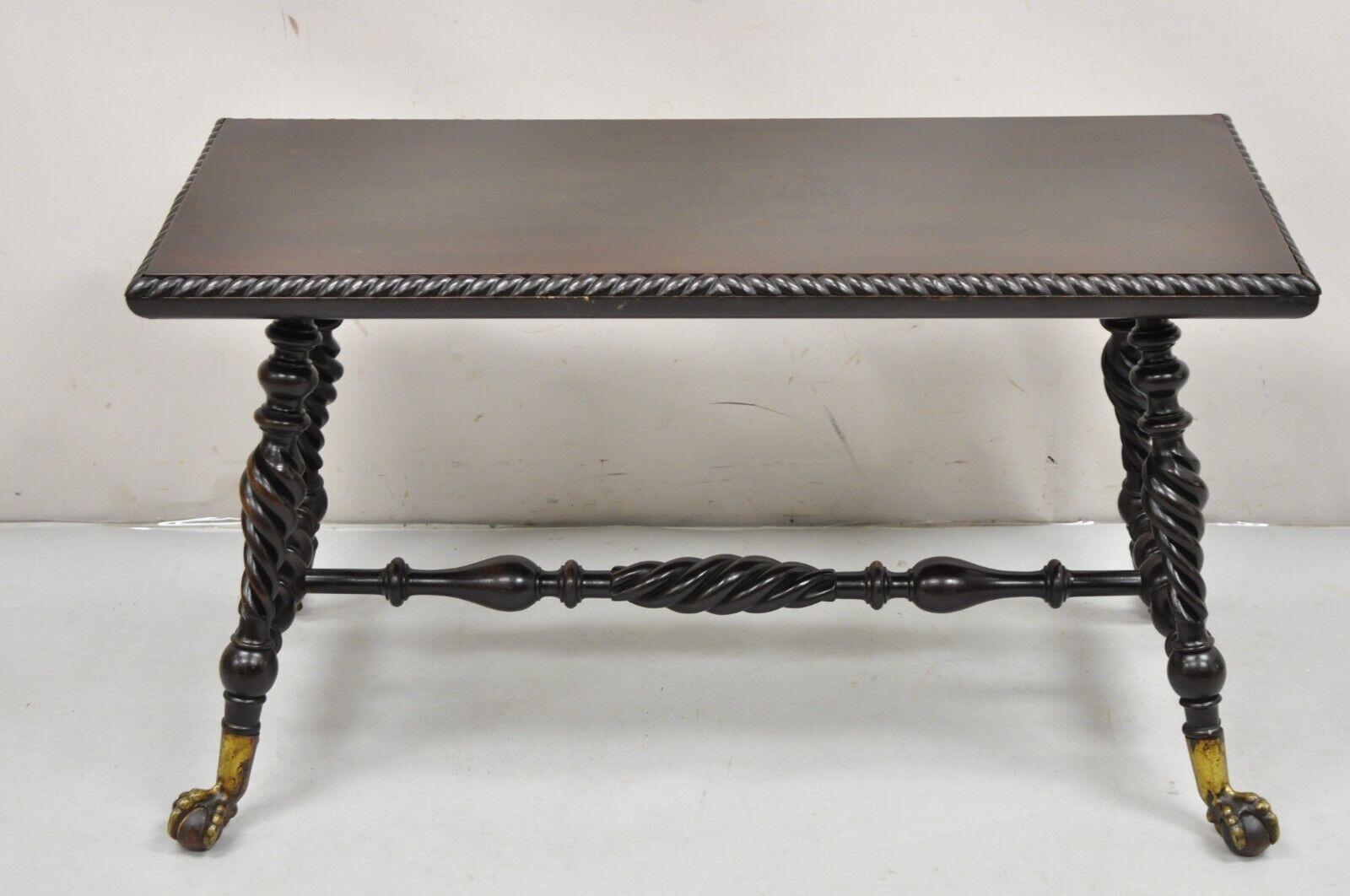 Antique Merklen Brothers Victorian Barley Twist Mahogany Ball and Claw Coffee Table Piano Bench. Circa 19th Century.
Measurements: 
Overall: 20.5