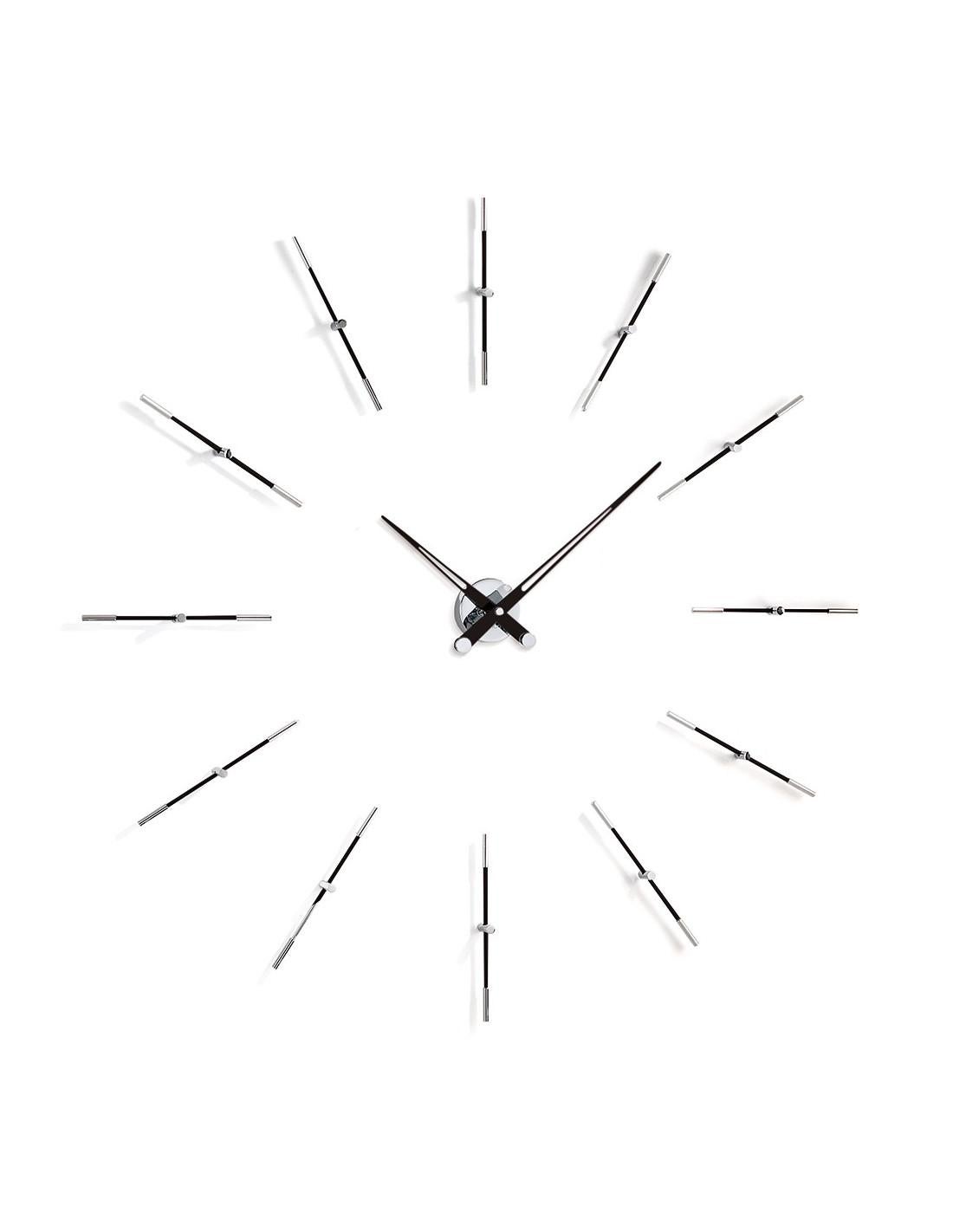 Merlín 12 i wall clock is ideal for decorating modern spaces of both a house and an office .
 Merlín 12 i wall clock : Case made of chromed steel , Clock hand made of Polished Steel or painted in black, White and red.
Each clock is a unique