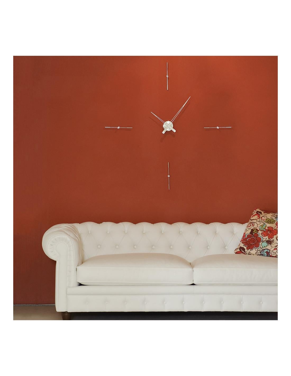 Merlín 4 i wall clock is ideal for decorating modern spaces of both a house and an office.
Merlín 4 i wall clock : Case made of chromed steel, Clock hand made of Polished Steel or painted in black, White and red.
Each clock is a unique handmade