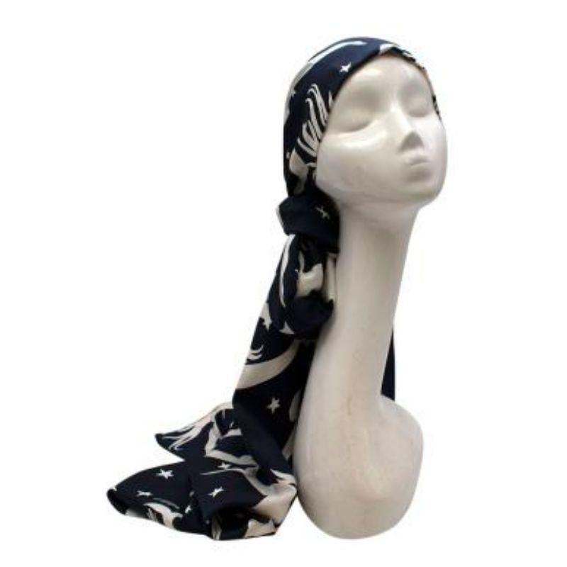 Valentino Mermaid Print Navy Silk Headscarf
 
 
 
 - Fluid silk body 
 
 - All over mermaid print 
 
 - Tie fastening 
 
 
 
 Matching suit set available in a separate listing
 
 
 
 Material:
 
 100% Silk 
 
 
 
 Made in Italy 
 
 
 
 Dry clean