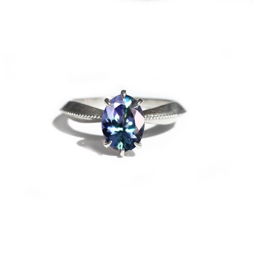 Oval Cut Mermaid Tanzanite Vintage Inspired Tapered 18 Karat White Gold Solitaire Ring