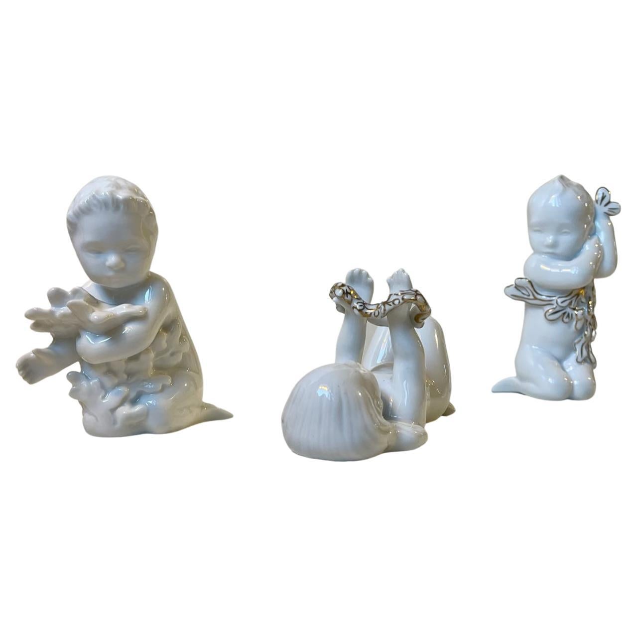 Figurines en porcelaine de la progéniture des sirènes par Sadolin & Jespersen - Bing & Grøndahl