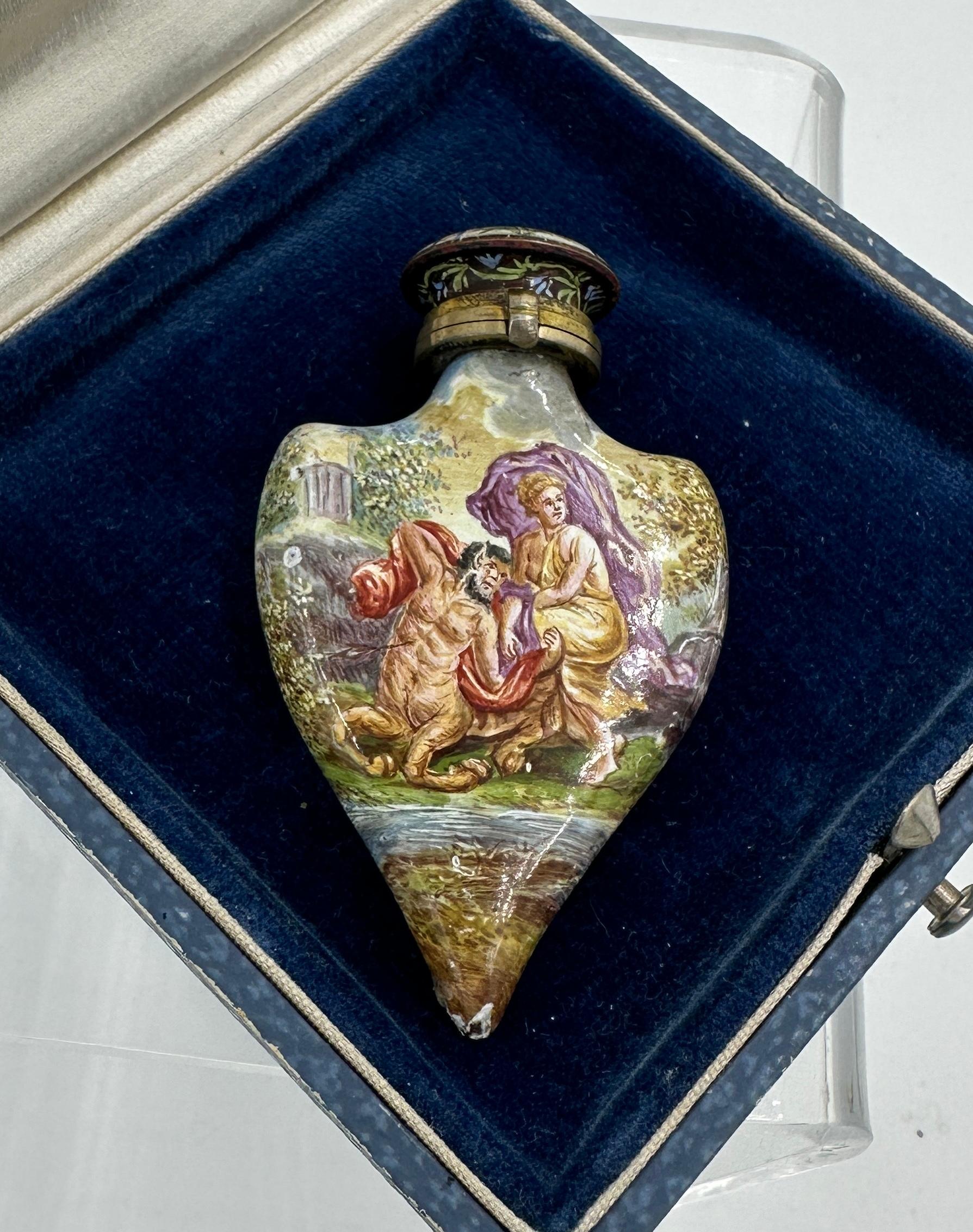 INDULGE IN A MUSEUM QUALITY PERFUME BOTTLE VINAIGRETTE DECORATED WITH HAND PAINTED NEOCLASSICAL ENAMEL IMAGES OF MERMEN, CENTAUR, GODDESS MAIDENS, AND FISH IN A BUCOLIC PASTORAL SCENE OF EXTRAORDINARY BEAUTY.   THE PERFUME IS SILVER GILT AND DATES