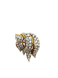Broche Merrin de platino y oro de 18 quilates con diamantes