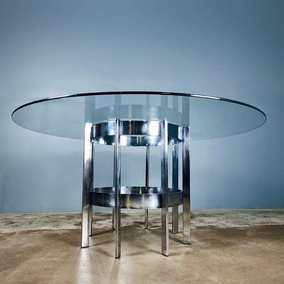 New Stock ✅

Merrow Associates Chrome & Glass Dining Table 'The Preece' 378g By Richard Young

Large Circular toughened glass top dining with chrome base, designed by Richard Young in the late 1970s. Merrow Associates was started by Richard Young,