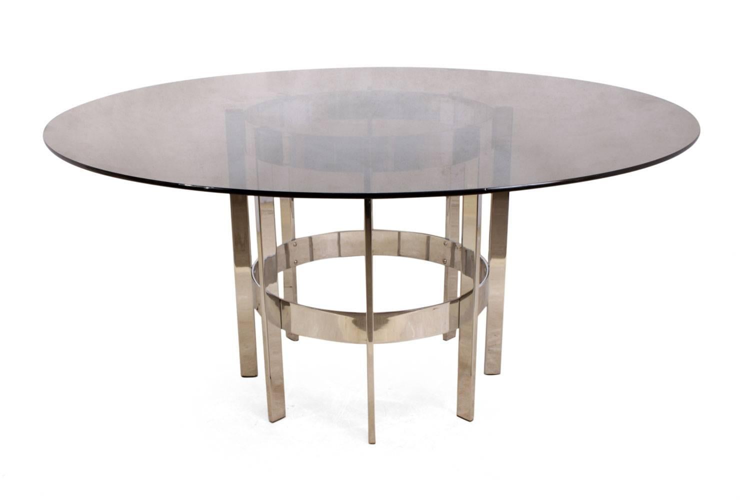 Merrow Associates dining table and eight chairs
This British produced Merrow Associates Dining suite consists of a Dining table with smoked glass top ( a few light scratches to top) and chrome base the chrome is in excellent condition, the set of