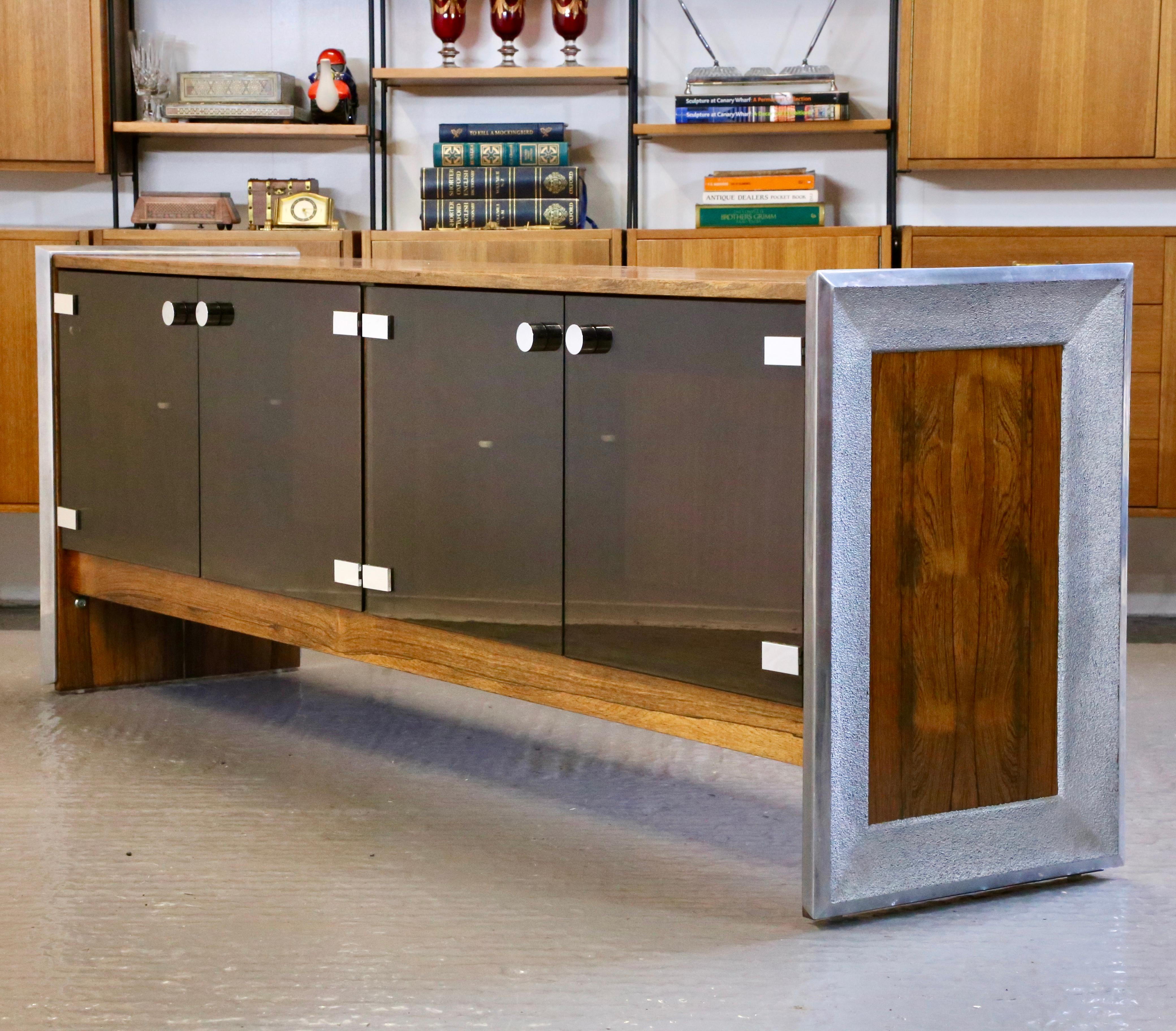 ‘Design, fine finishes and luxury materials are the unmistakable Merrow Associates hallmark’

A Rare Fine Mid Century Modern stylish sideboard, designed by Richard Young for Merrow Associates. The sideboard features high quality Rosewood, Chrome