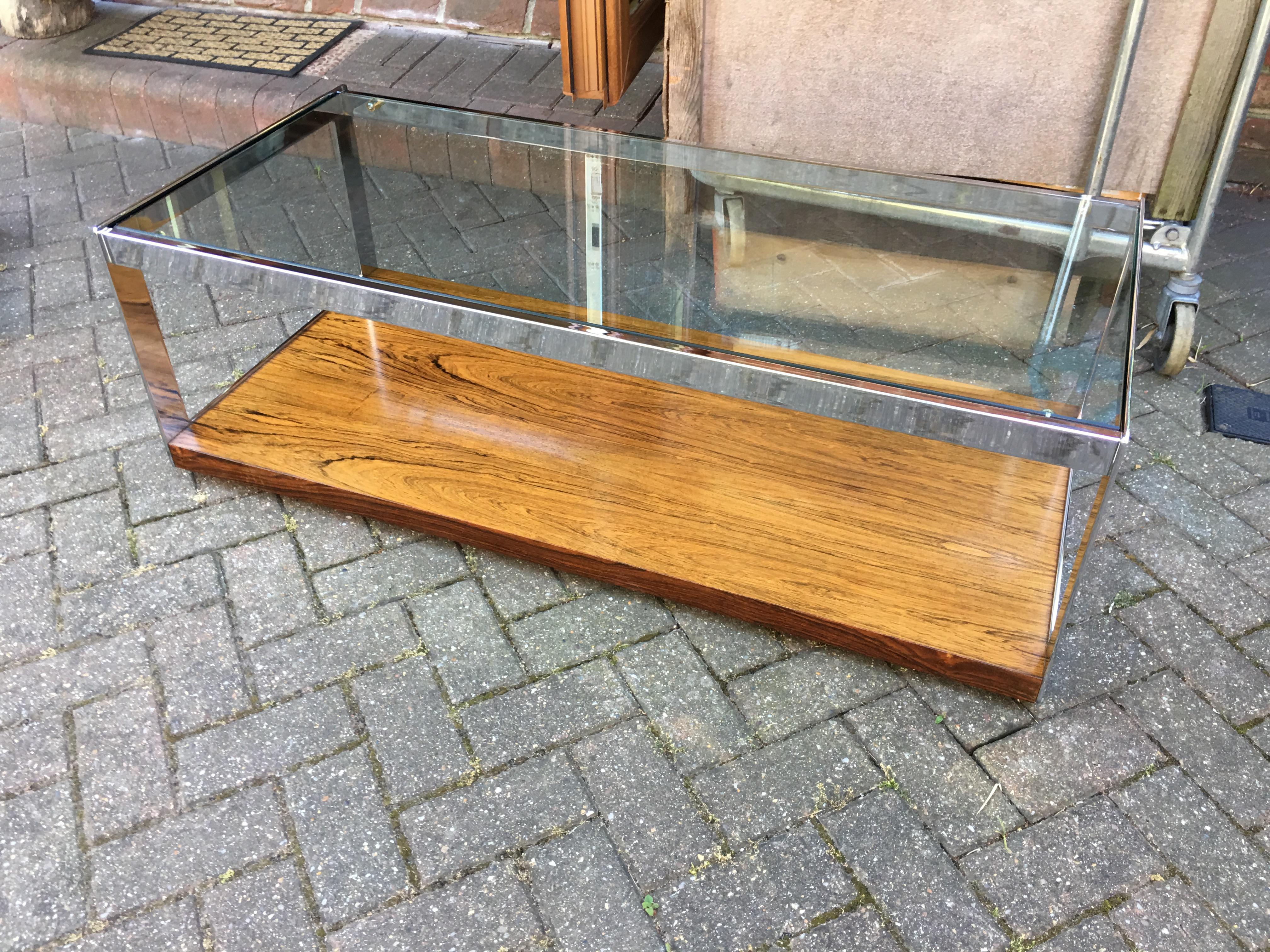 As usual, a very nice quality piece from Merrow, the rosewood on the base has nice figuring, the chrome on the steel frame is high quality, as is the glass top.
All in great condition.