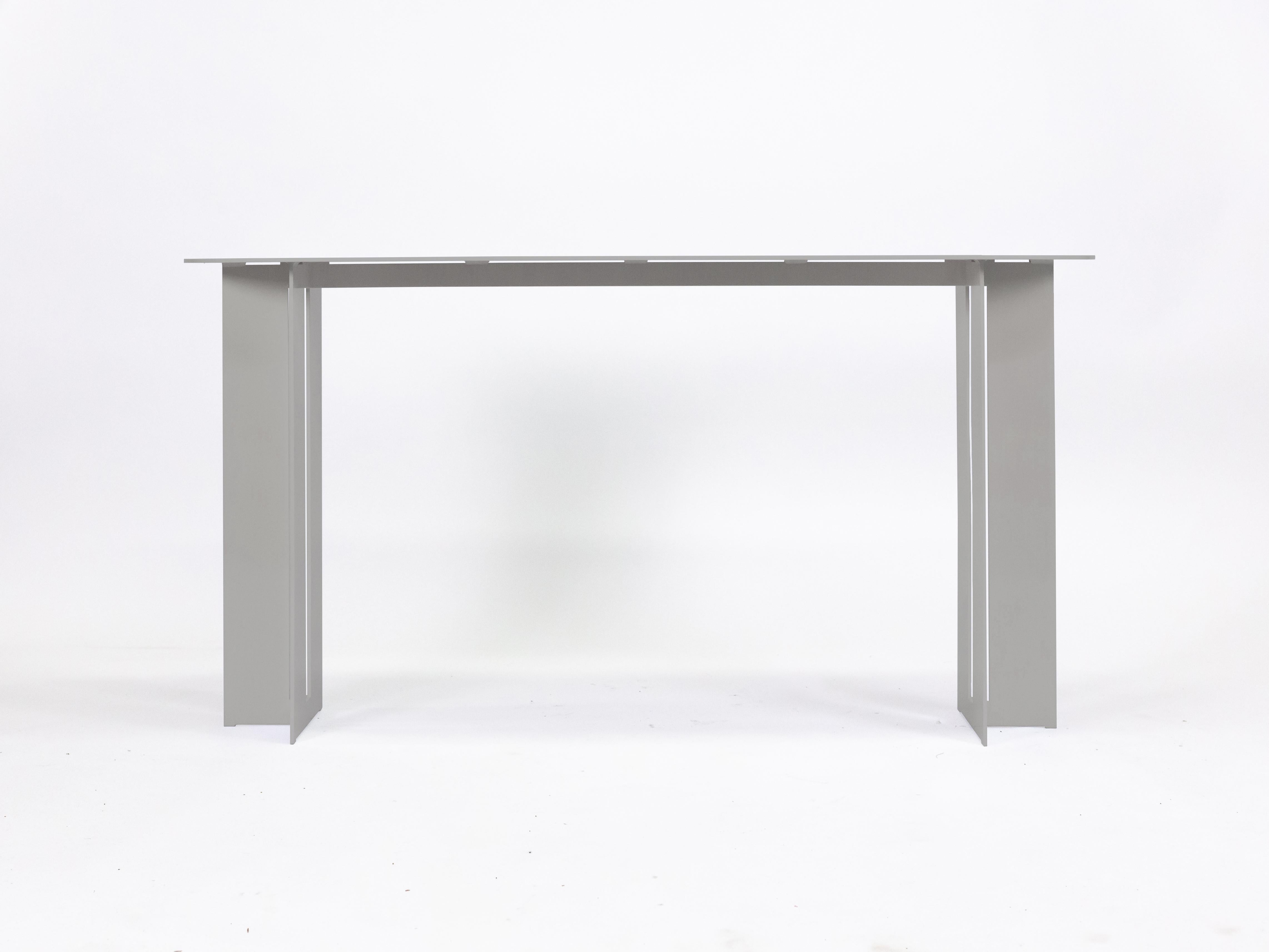The Mers console table is fabricated from solid aluminum and is suitable for use indoors and out. Form is inspired by the simple utilitarianism of West Coast aluminum fishing boats.

Shown in aluminum with satin finish.
Custom sizing and powdercoat