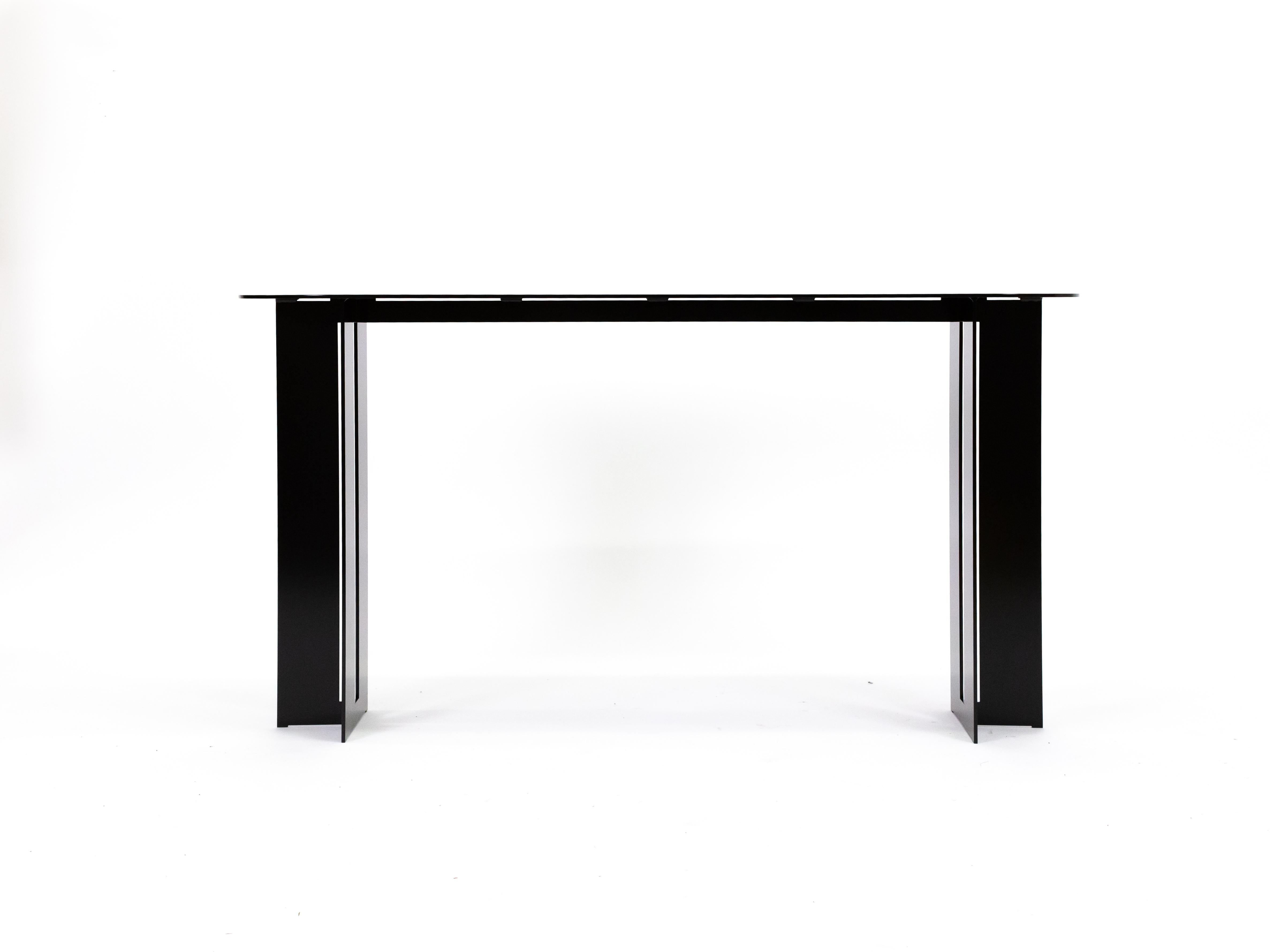 The Mers Console Table is fabricated from solid aluminum and is suitable for use indoors and out. Form is inspired by the simple utilitarianism of West Coast aluminum fishing boats.

Shown in aluminum with Black painted finish.
Custom sizing and