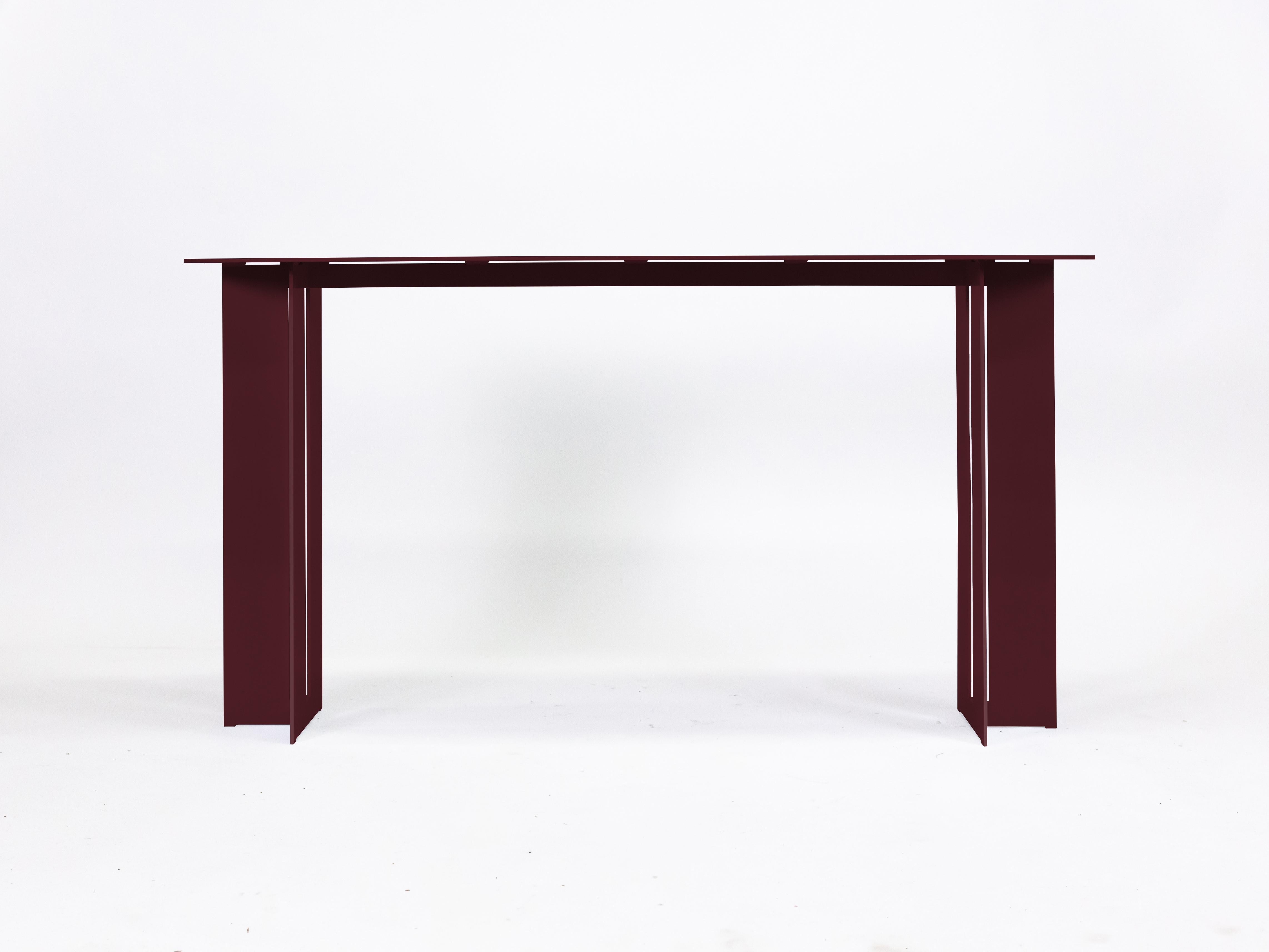 The Mers console table is fabricated from solid aluminum and is suitable for use indoors and out. Form is inspired by the simple utilitarianism of West Coast aluminum fishing boats.

Shown in aluminum with burgundy painted finish.
Custom sizing and