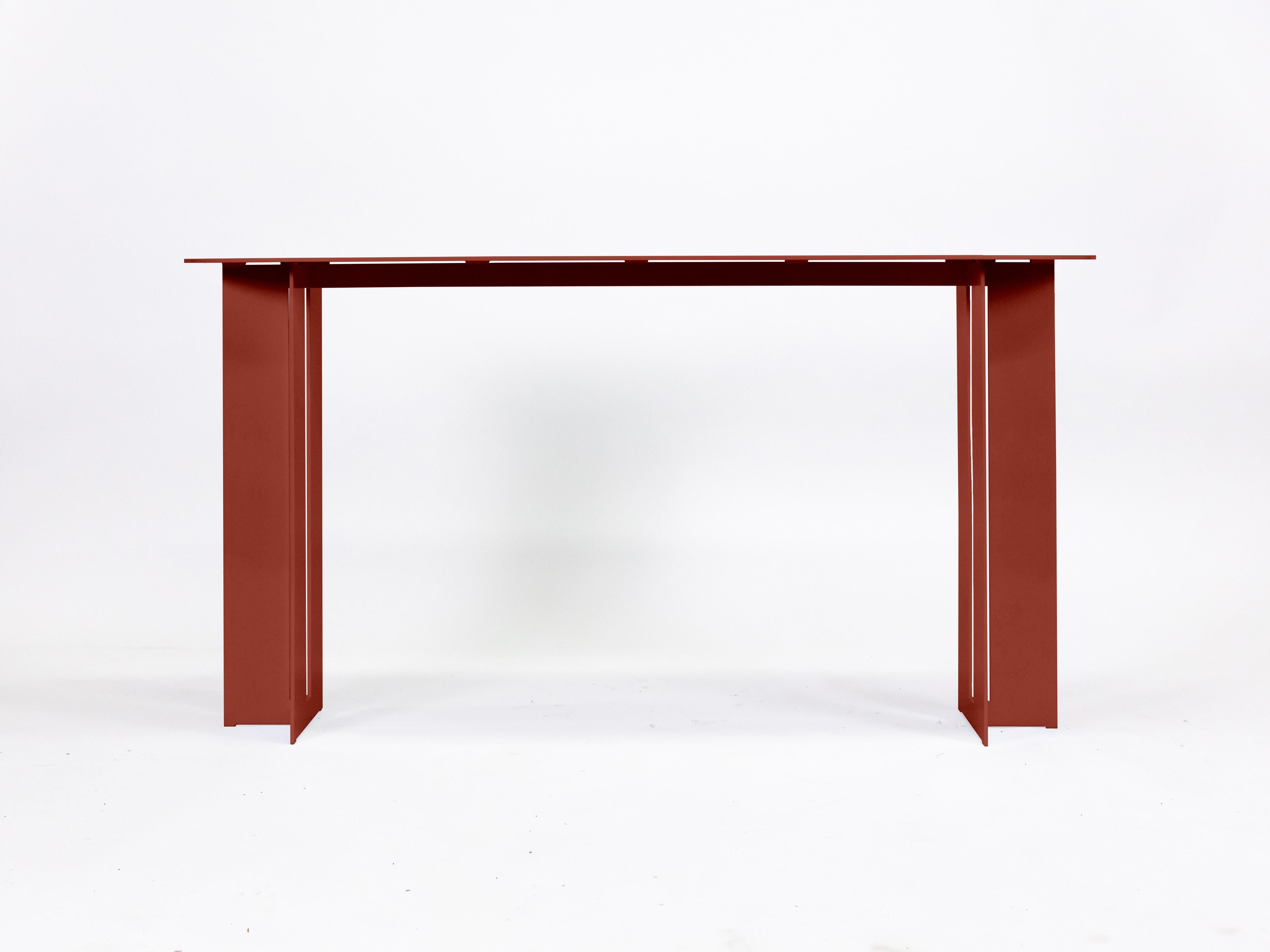 The Mers console table is fabricated from solid aluminum and is suitable for use indoors and out. Form is inspired by the simple utilitarianism of West Coast aluminum fishing boats.

Shown in aluminum with ochre painted finish.
Custom sizing and