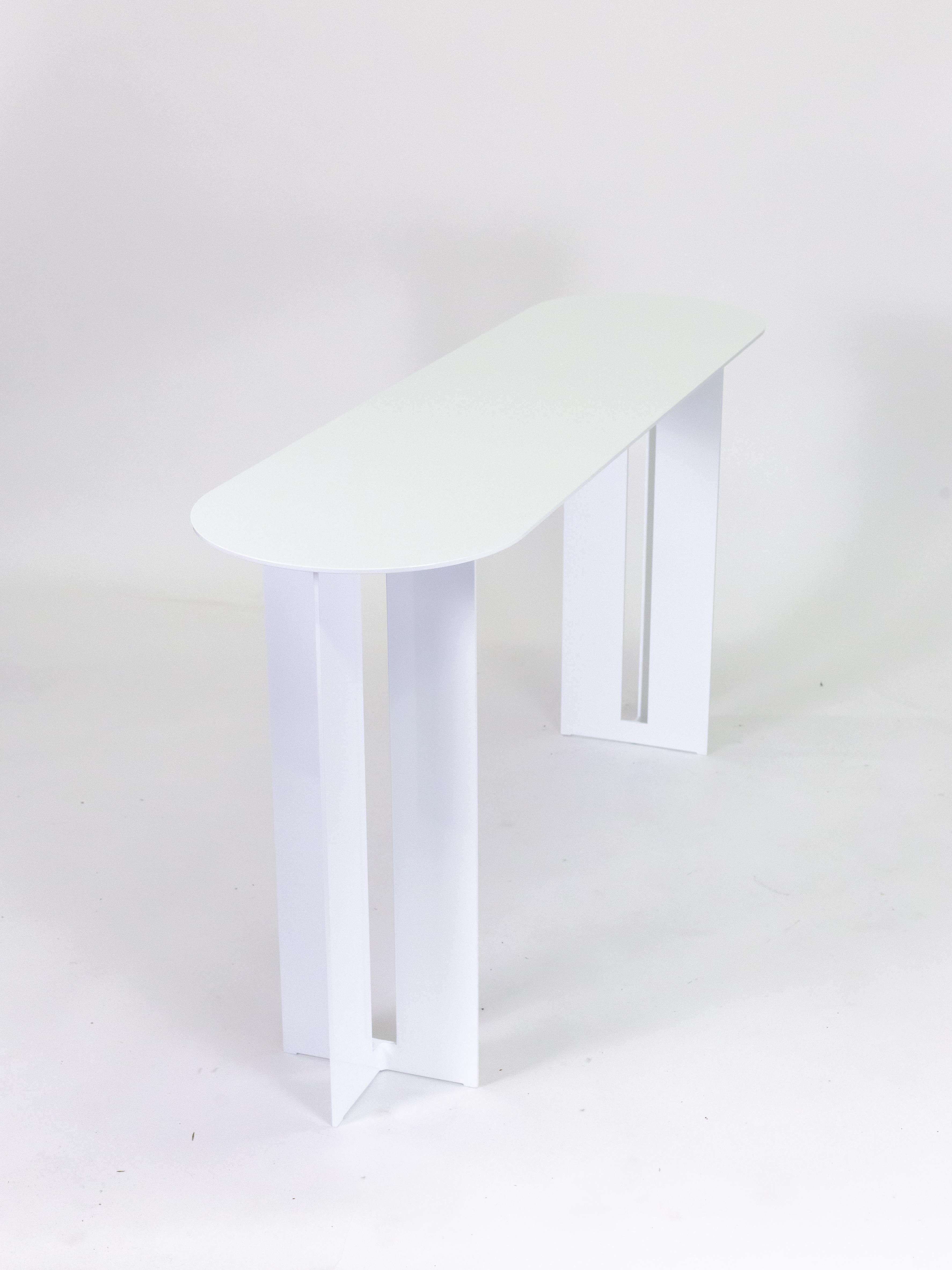 The Mers Console Table is fabricated from solid aluminum and is suitable for use indoors and out. Form is inspired by the simple utilitarianism of West Coast aluminum fishing boats.

Shown in aluminum with White painted finish.
Custom sizing and