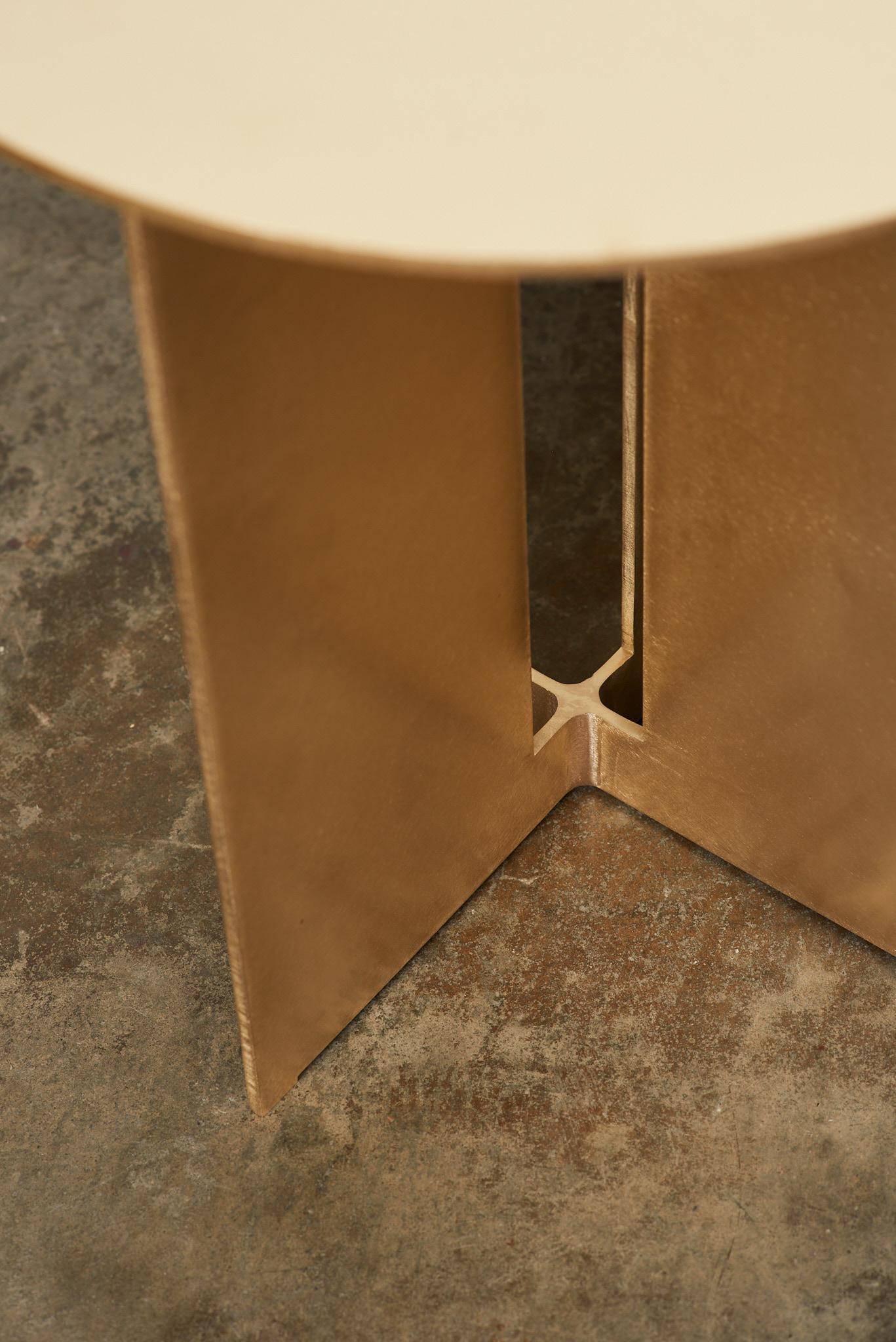 The Mers side table is fabricated from solid bronze and is suitable for use indoors and out. Form is inspired by the simple utilitarianism of West Coast aluminum fishing boats.

Shown in Satin Bronze finish.
Custom sizing available.

Overall