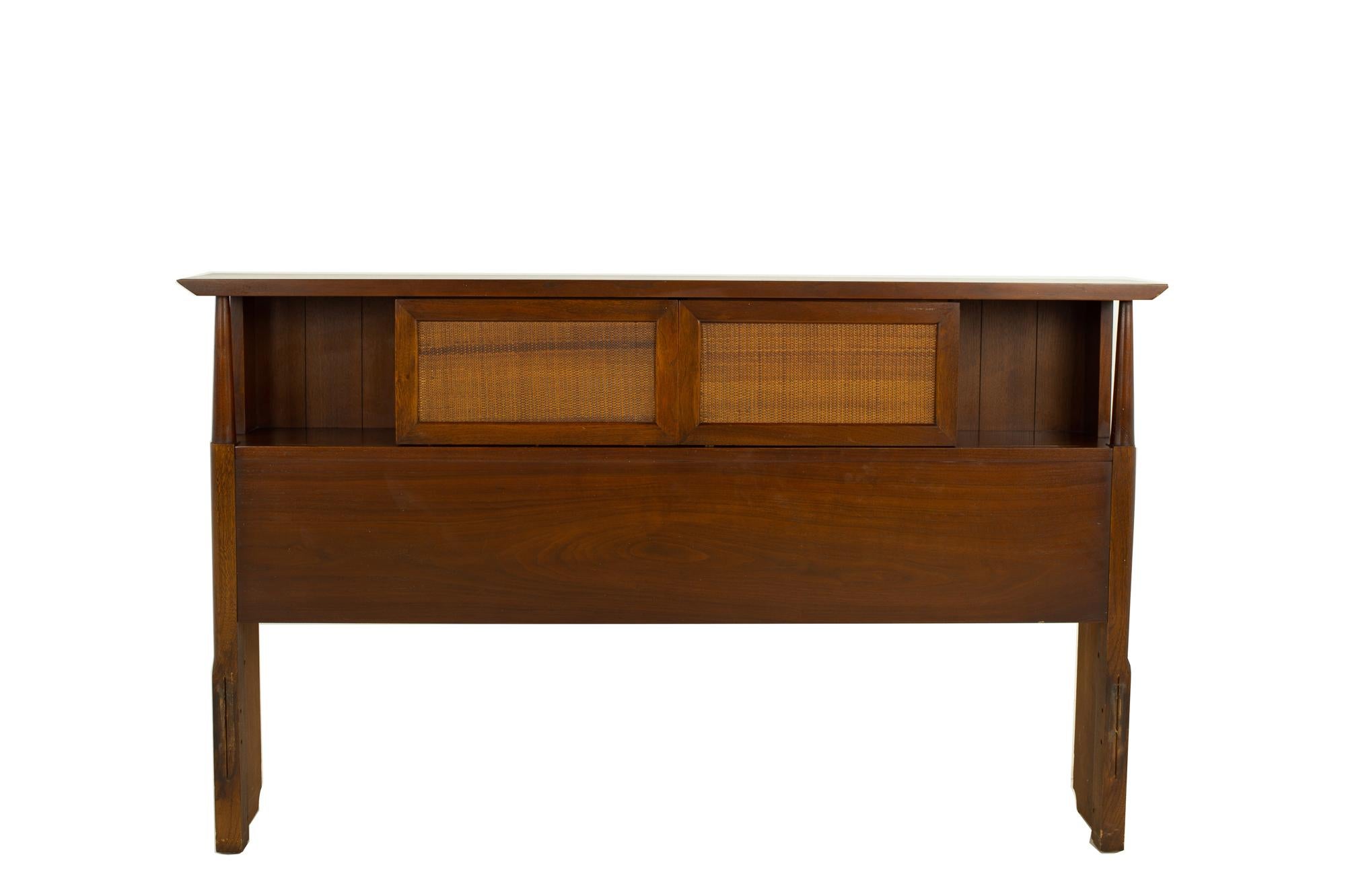 Merton Gershun for American of Martinsville mid century walnut and cane full storage headboard
Headboard measures: 59.75 wide x 9 deep x 35.5 inches high

?All pieces of furniture can be had in what we call restored vintage condition. That means