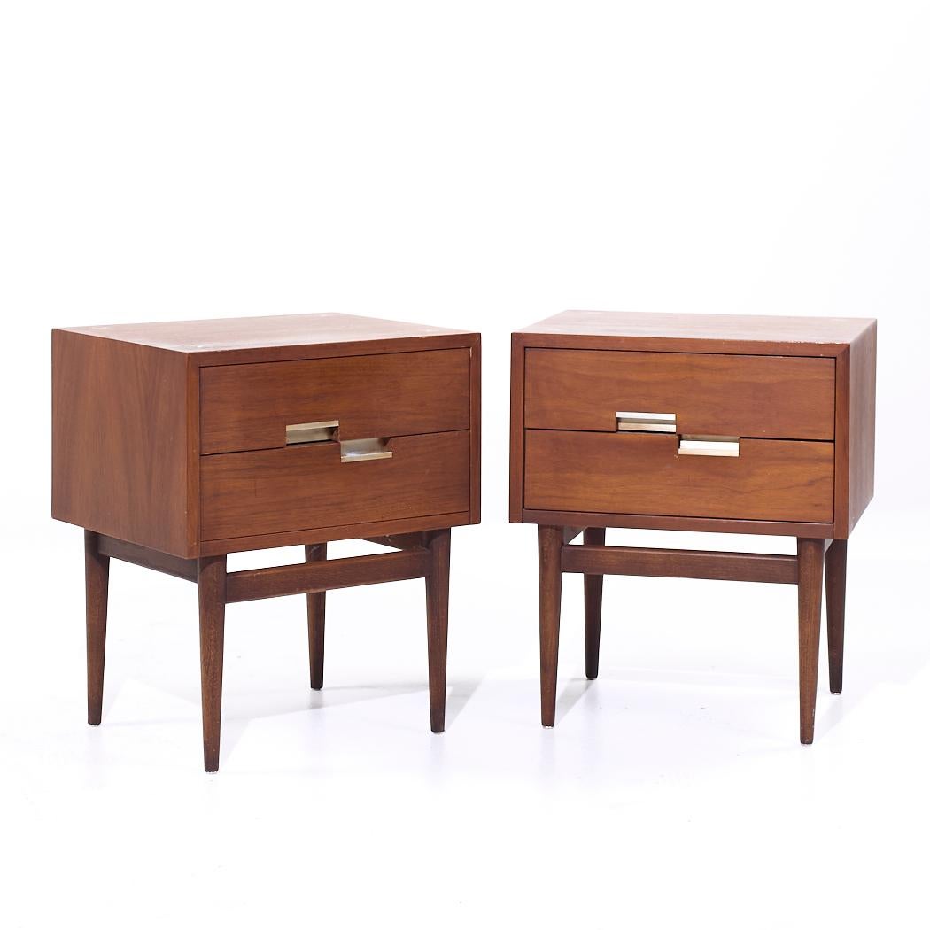 Merton Gershun for American of Martinsville Mid Century Walnut and Brass Nightstands - Pair

Each nightstand measures: 20 wide x 16 deep x 24 inches high

All pieces of furniture can be had in what we call restored vintage condition. That means the
