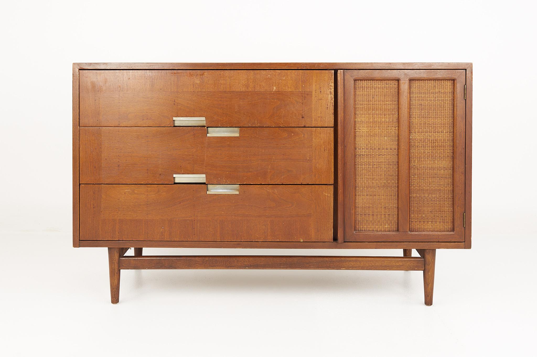 Merton Gershun for American of Martinsville mid century walnut and cane door credenza

This credenza measures: 50 wide x 18.5 deep x 31 inches high

?All pieces of furniture can be had in what we call restored vintage condition. That means the