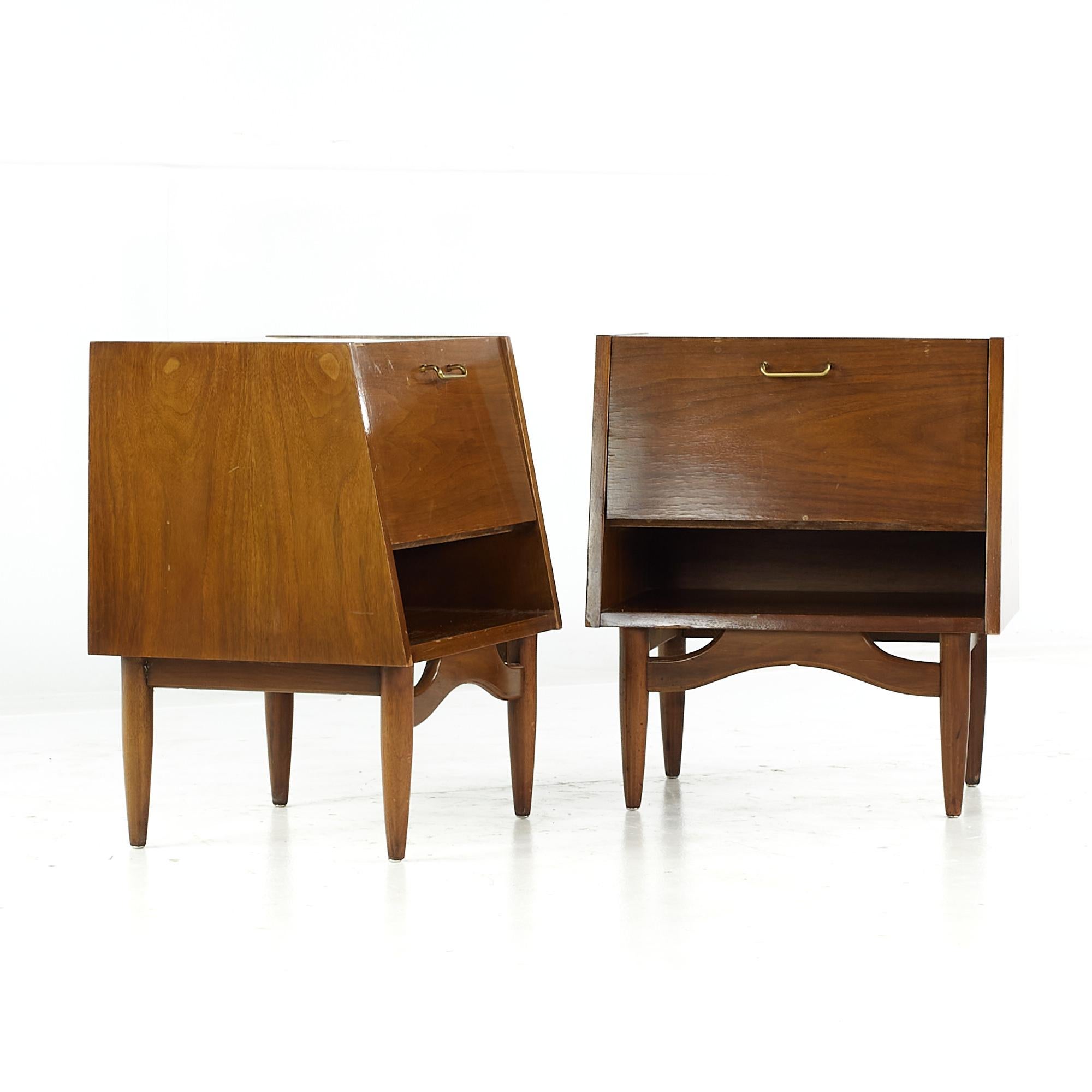 Merton Gershun for American of Martinsville mid-century walnut nightstands - pair.

Each nightstand measures: 22 wide x 17 deep x 25.25 inches high.

All pieces of furniture can be had in what we call restored vintage condition. That means the