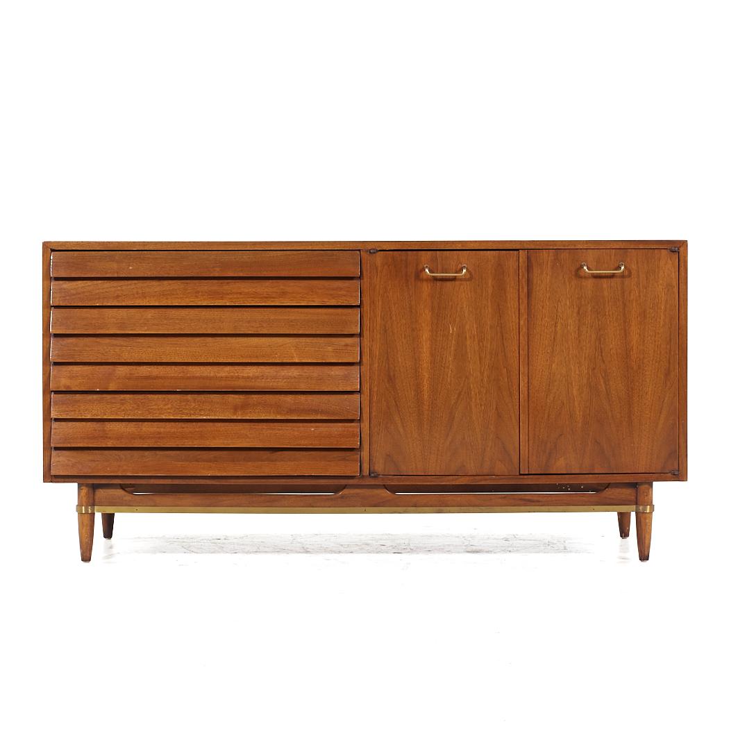 Merton Gershun for American of Martinsville Walnut and Brass Lowboy Dresser

This lowboy measures: 60 wide x 19 deep x 30.25 inches high

All pieces of furniture can be had in what we call restored vintage condition. That means the piece is restored