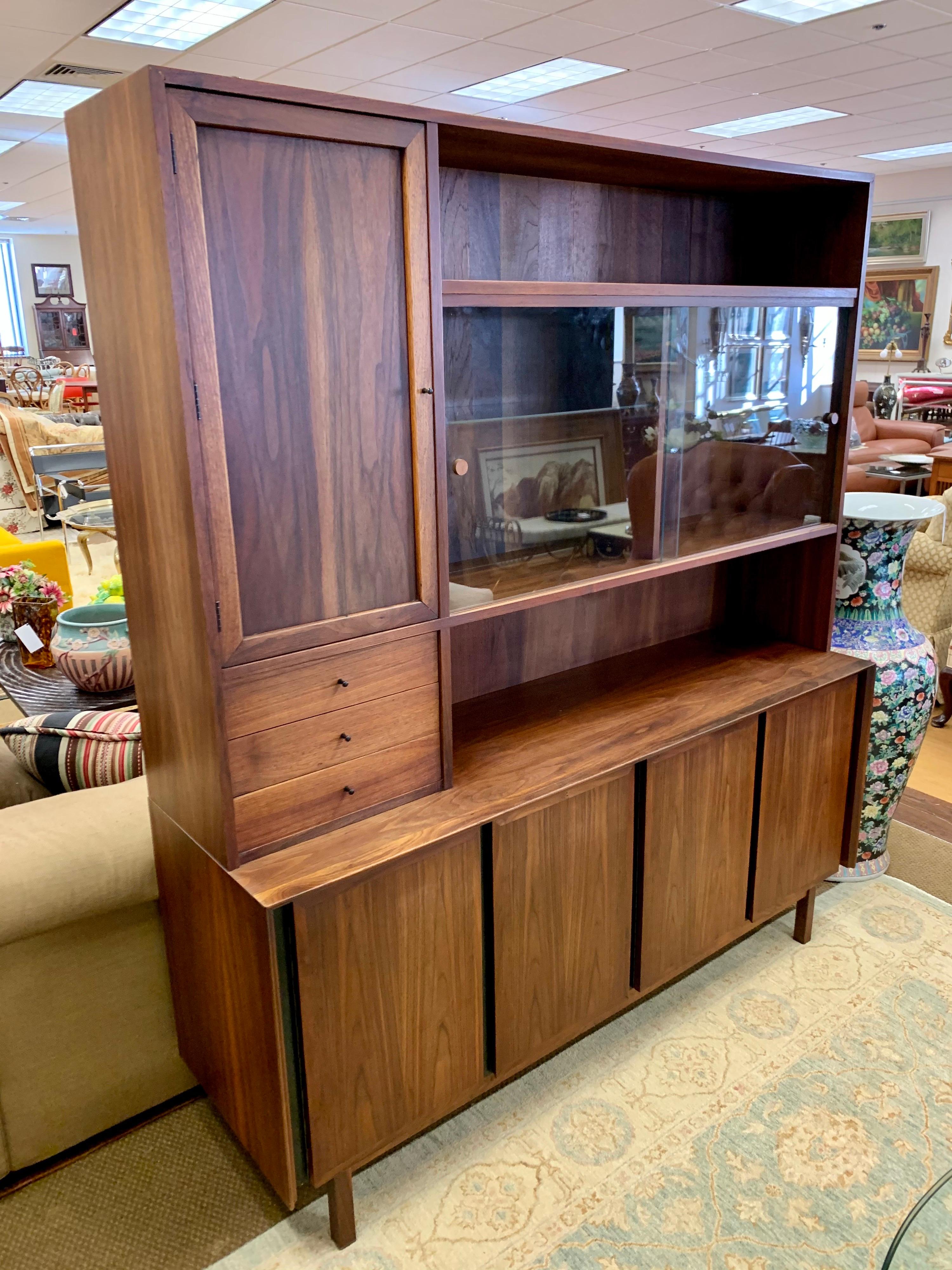 Magnificent two-piece cabinet/credenza by Merton Gershun for Dillingham as part of the 