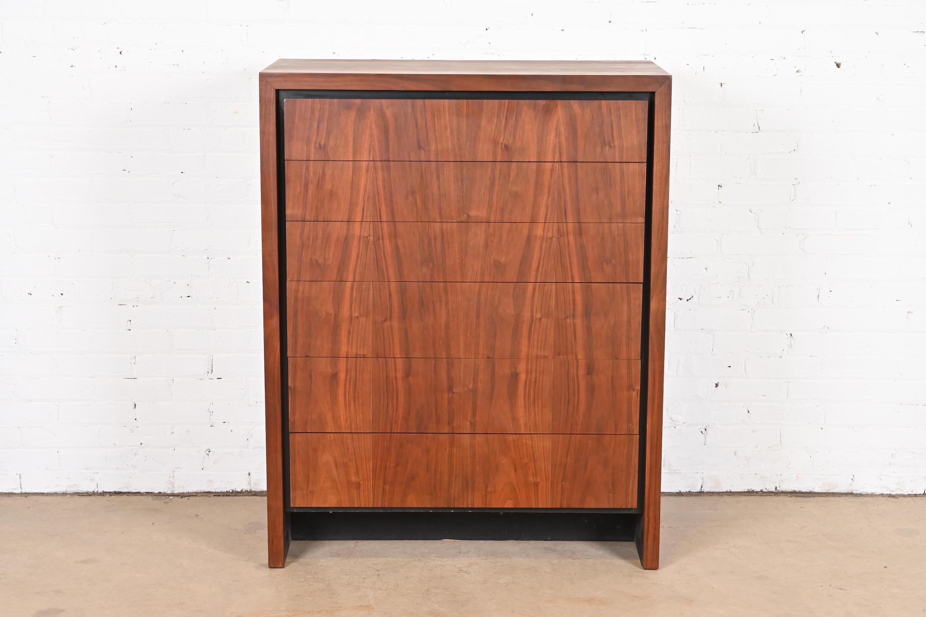 A gorgeous Mid-Century Modern book-matched walnut six-drawer highboy dresser
By Merton Gershun for Dillingham
USA, 1960s
Measures: 38