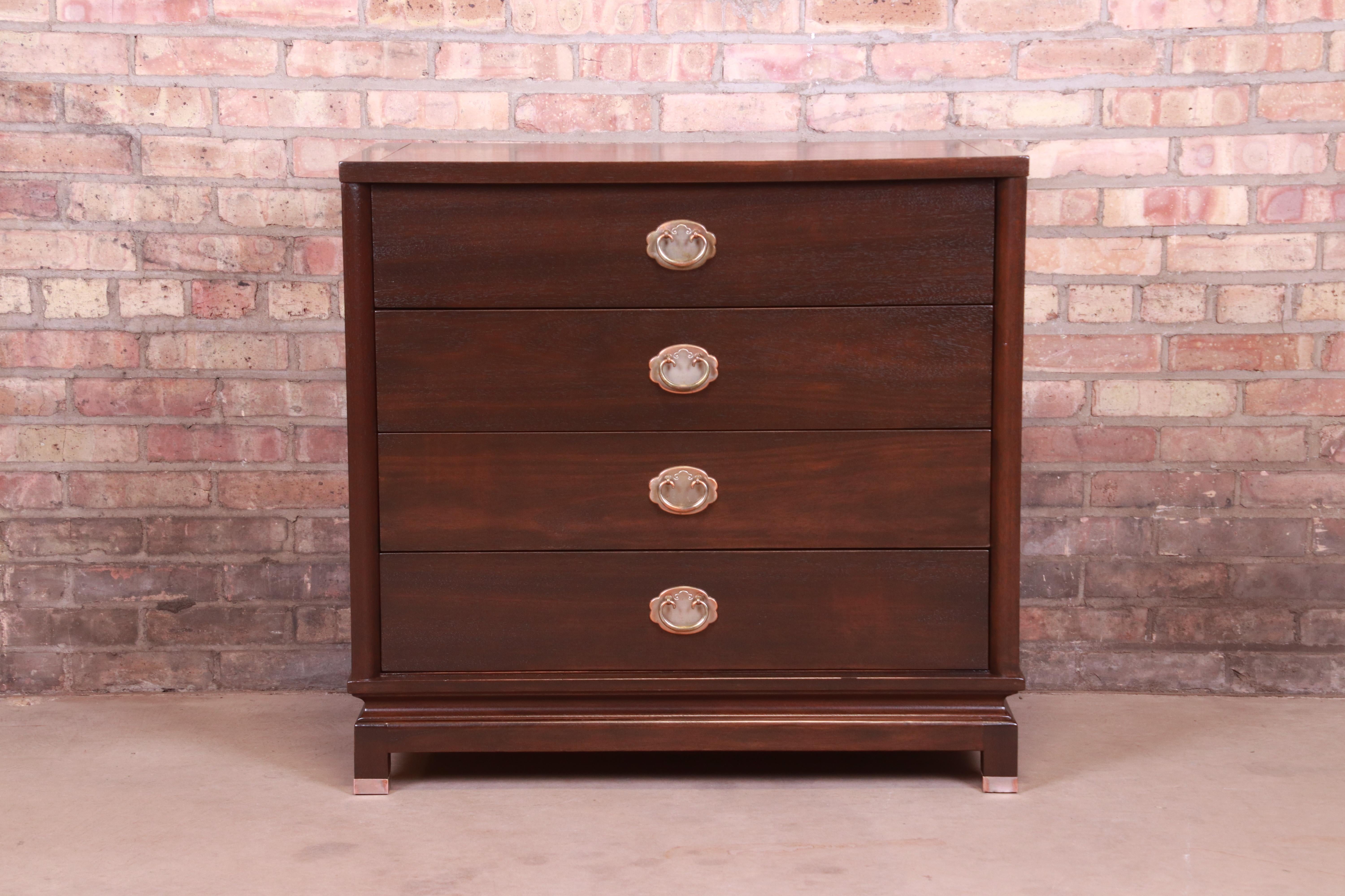 An exceptional Mid-Century Modern Hollywood Regency Chinoiserie four-drawer dresser chest

By Merton Gershun for American of Martinsville,

USA, Circa 1960s

Walnut, with Asian-inspired brass hardware.

Measures: 34.13