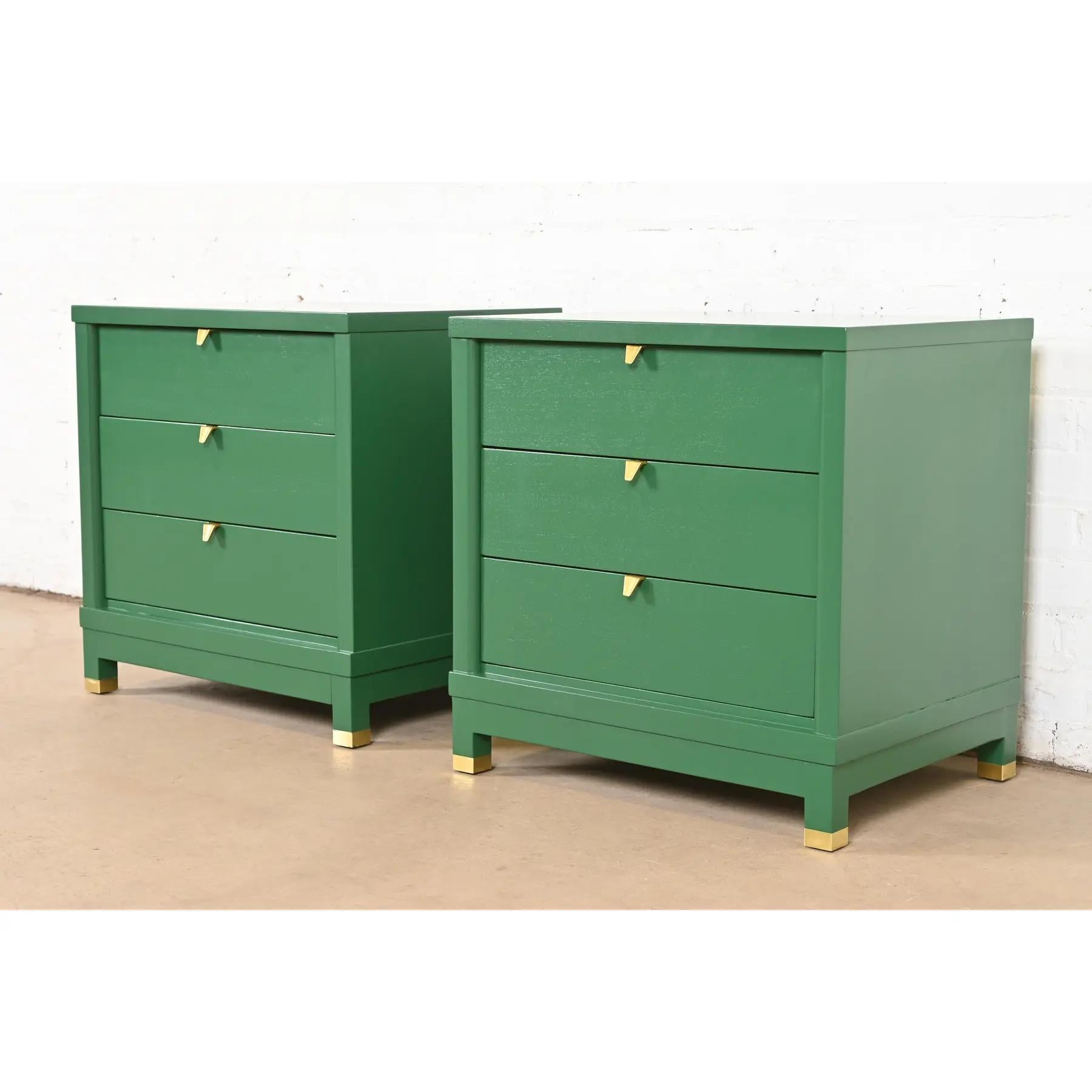 A gorgeous pair of mid-century modern Hollywood Regency Campaign style three-drawer nightstands, bedside chests, or end tables

By Merton Gershun for American of Martinsville

USA, Circa 1960s

Green lacquered walnut, with original brass