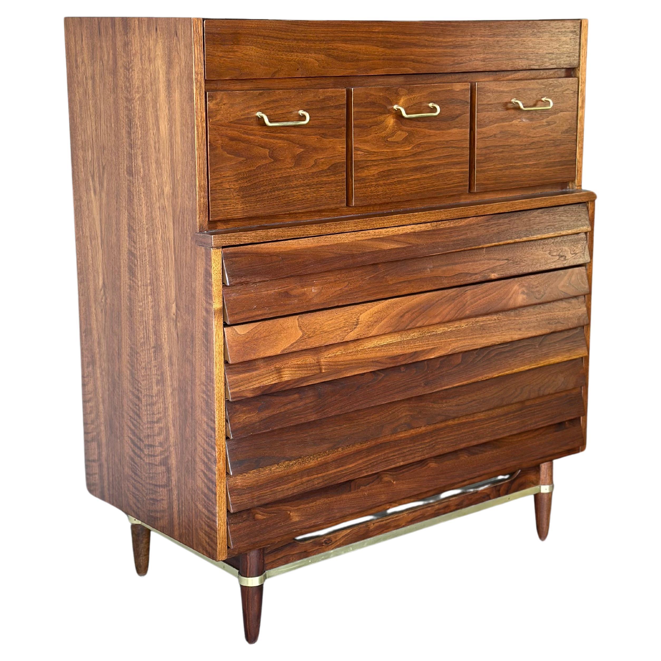This professionally restored tall dresser, from American of Martinsville's 
