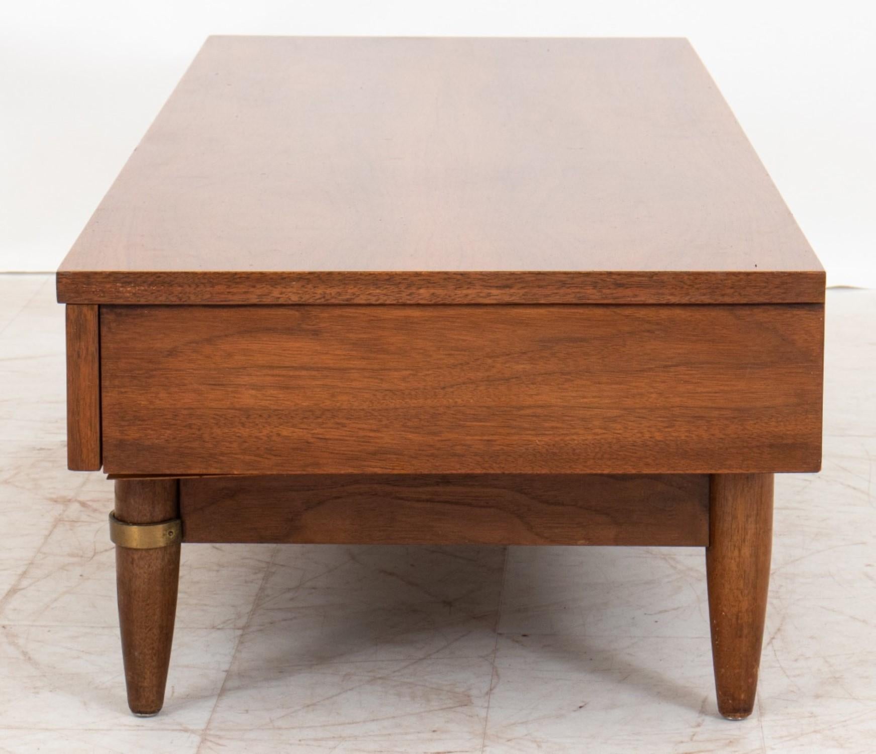 
The dimensions for the American of Martinsville Mid-Century Modern Low Table or TV stand in walnut are approximately:

Height: 13 inches
Width: 54 inches
Depth: 18.75 inches