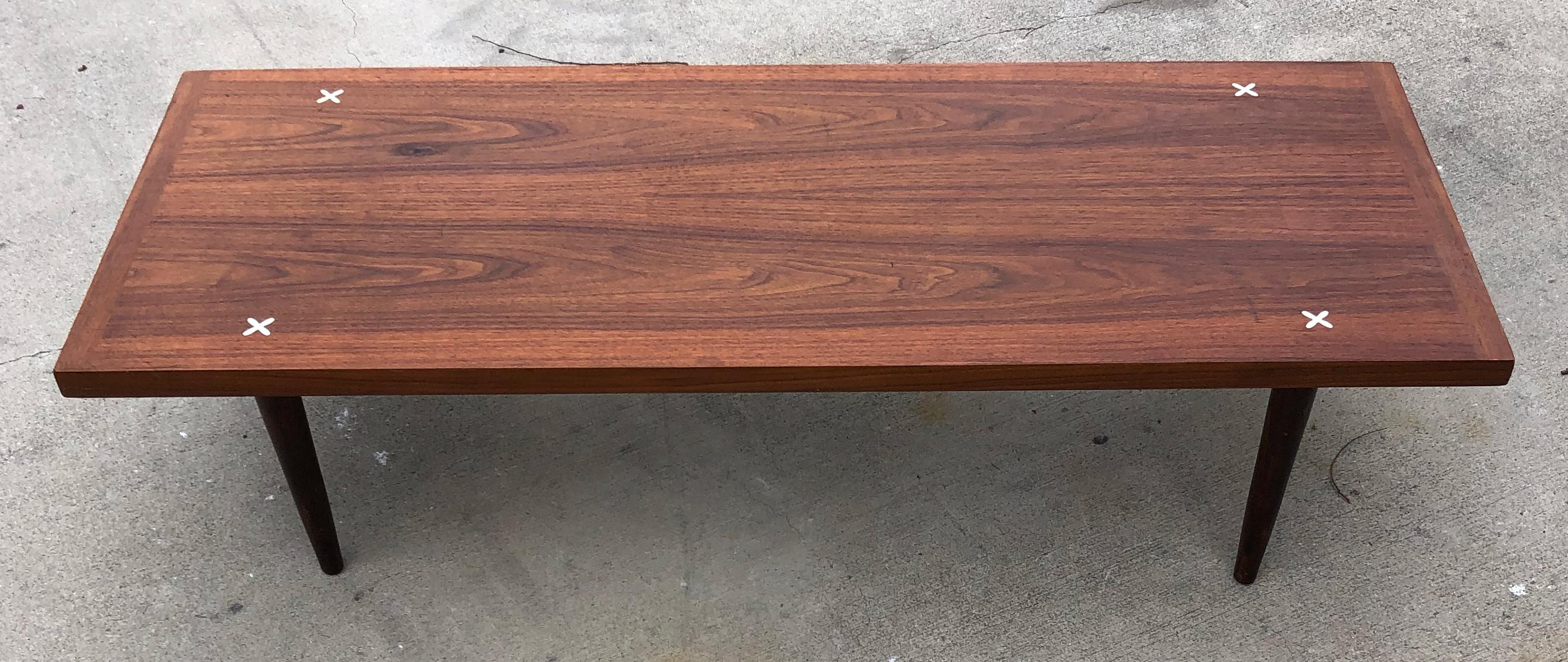 A beautiful Merton Gershun for American of Martinsville Mid Century X inlaid coffee table. Chic, beautiful simple line with a touch of fantasy. This remarkable piece was made with beautiful wood aaand finished perfectly. As I like to call it aa true