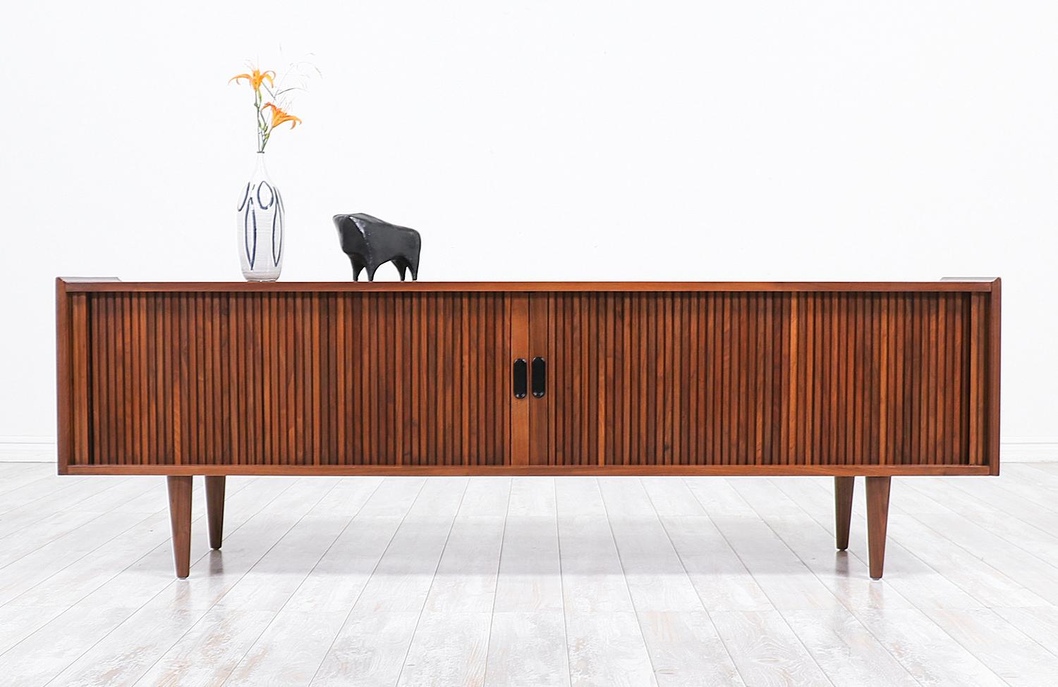 Merton L. Gershun low profile tambour-door credenza for Dillingham.