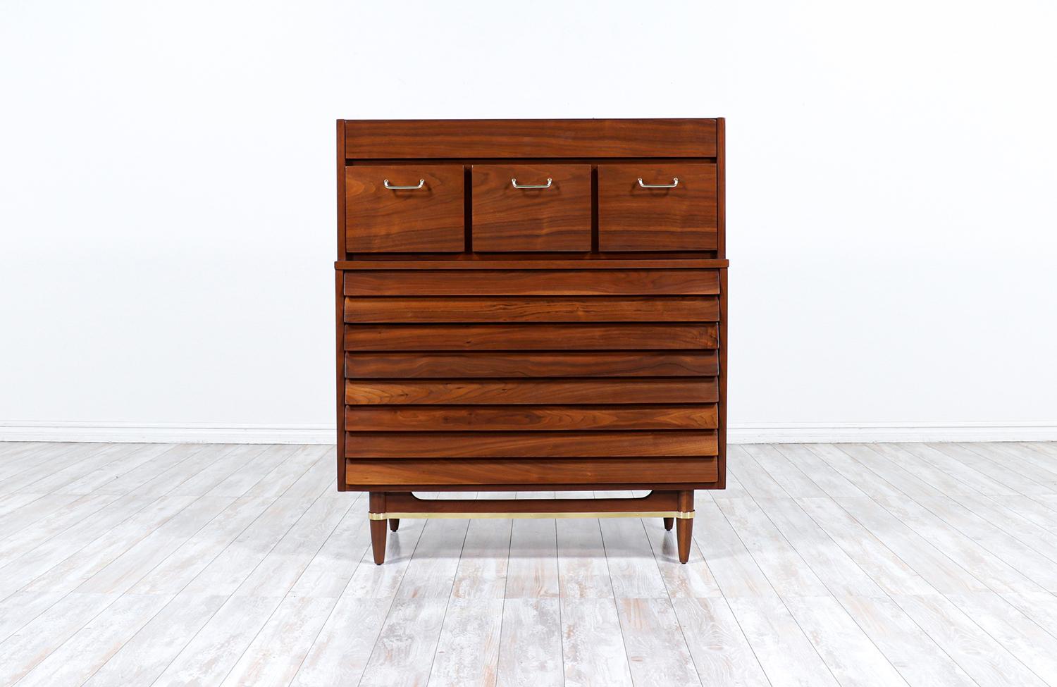 Merton L. Gershun walnut chest of drawers with brass accents for American of Martinsville.

________________________________________

Transforming a piece of Mid-Century Modern furniture is like bringing history back to life, and we take this
