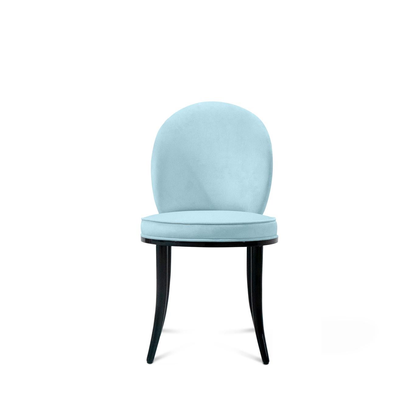 Entertain in haute style with the Merveille dining chairs. The stunning design turns the outside back of this graceful chair into a wondrous work of art!

As shown
Seat Upholstery: Lux Velvet Baby Blue (6031) from the Koket Textiles