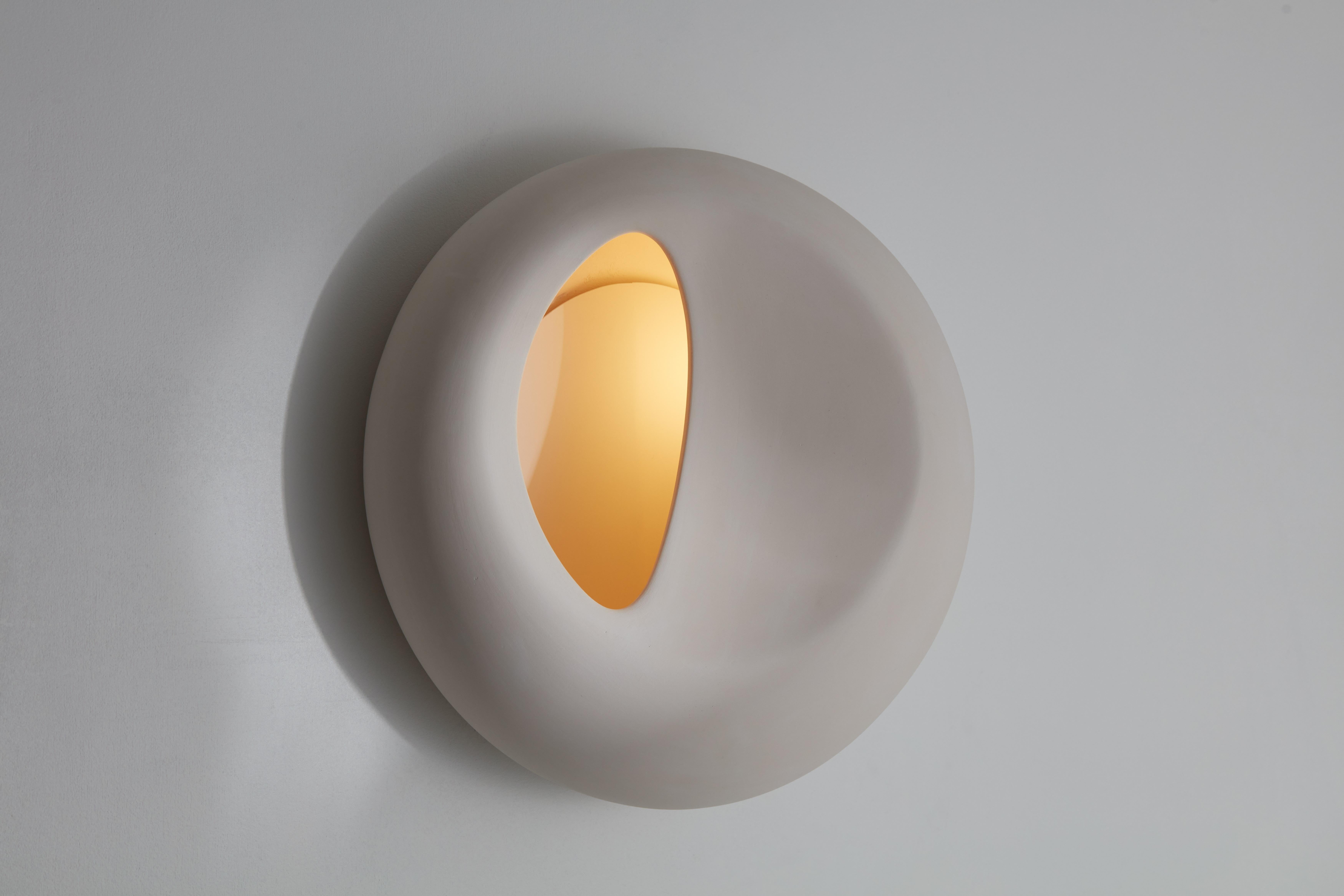 Merveilleux wall lamp by Mydriaz
Dimensions: D 36 x H 17 cm
Materials: Mass-dyed porcelain, brass.
Available in black.

Our products are handmade in our workshop. Dimensions and finishes may vary slightly from one model to another dimensions can be