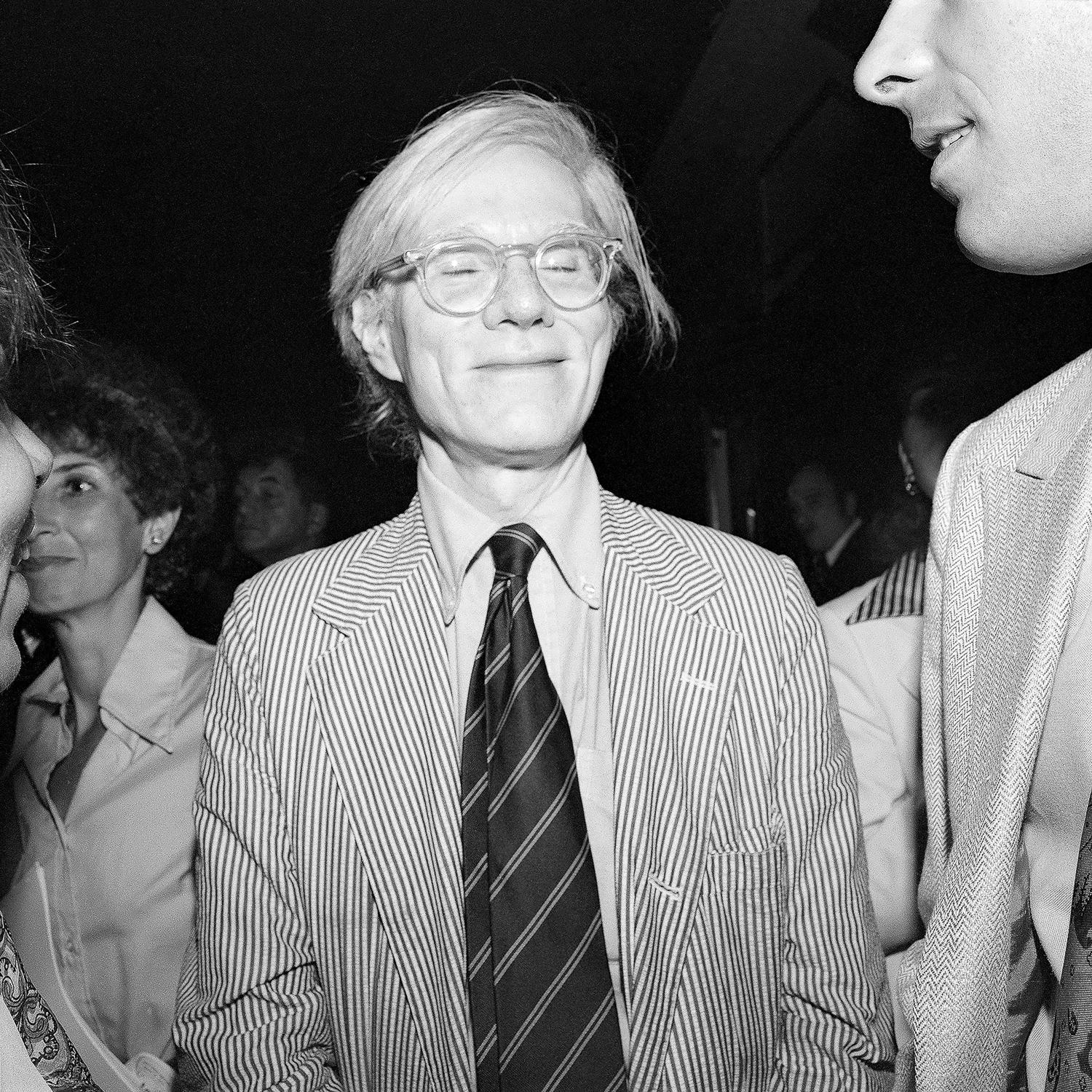 Portrait Photograph di Meryl Meisler - Andy Warhol che sorride con gli occhi chiusi, Studio A 54