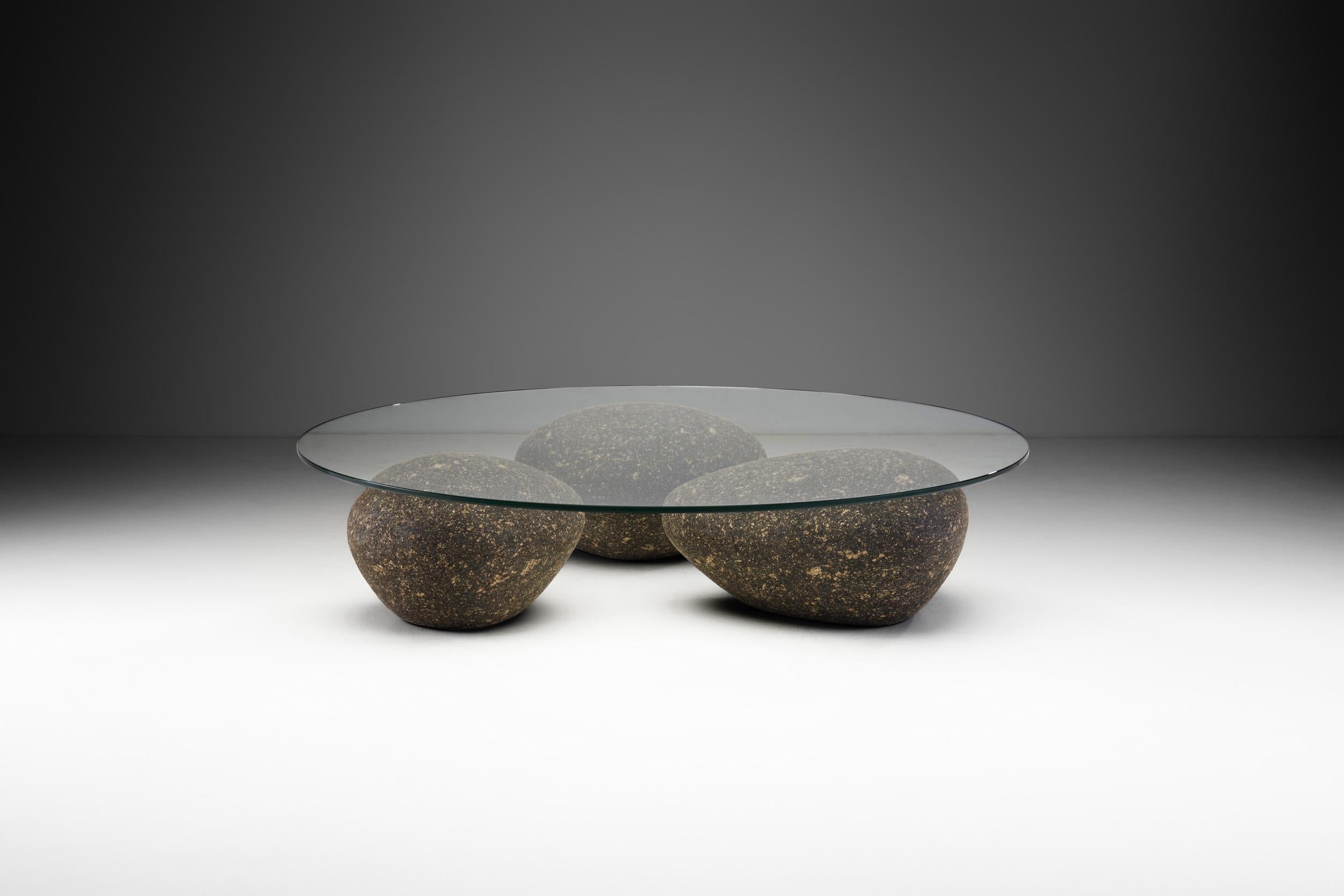 This Água table by contemporary artist Domingos Tótora, is an exceptional piece. The name, meaning water in Portuguese speaks for itself as the sight of this table’s design is akin to the process of sediment settling into a riverbed. There may be no