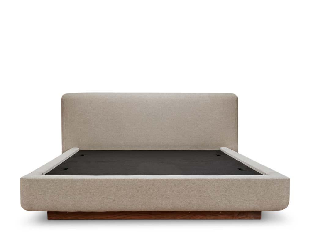The Mesa Bed is fully upholstered and features a deeply inset base constructed from American Walnut or White Oak. With its soft curves and recessed base it has a suggestion of levitation.

The Lawson-Fenning Collection is designed and handmade in